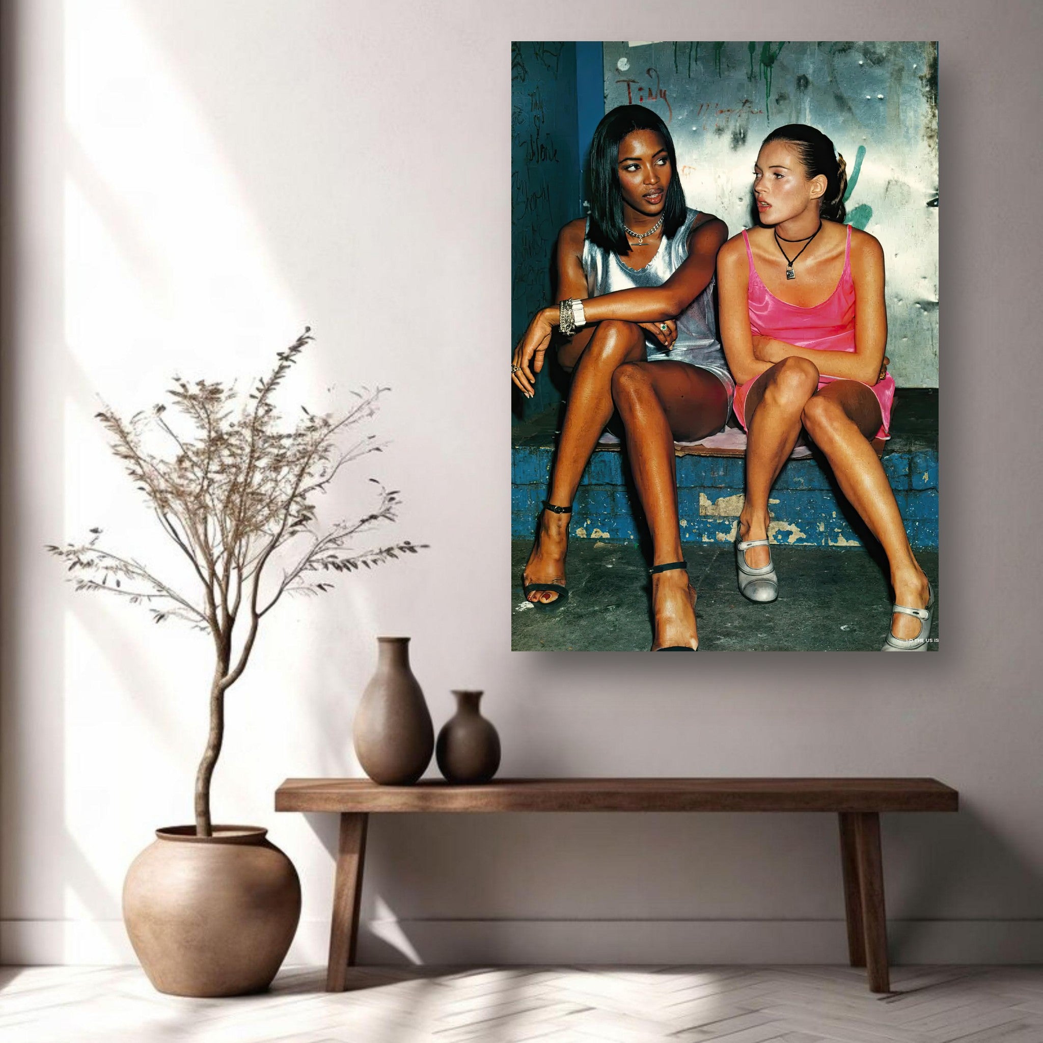 Naomi Campbell & Kate Moss Metal Print showcasing iconic 90s fashion in a stylish interior setting.