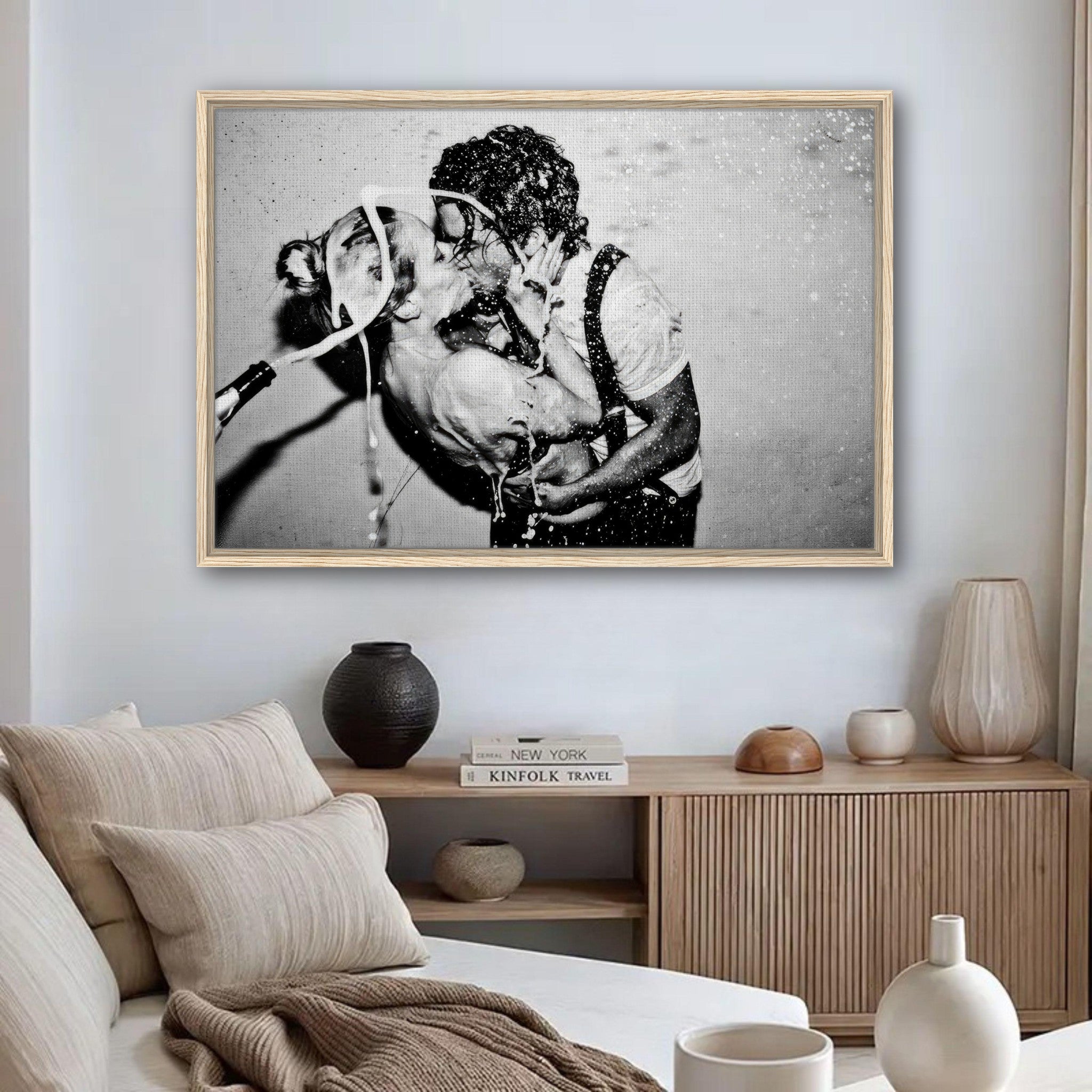 The Champagne Kiss framed canvas print featuring Johnny Depp and Kate Moss celebrating with champagne.