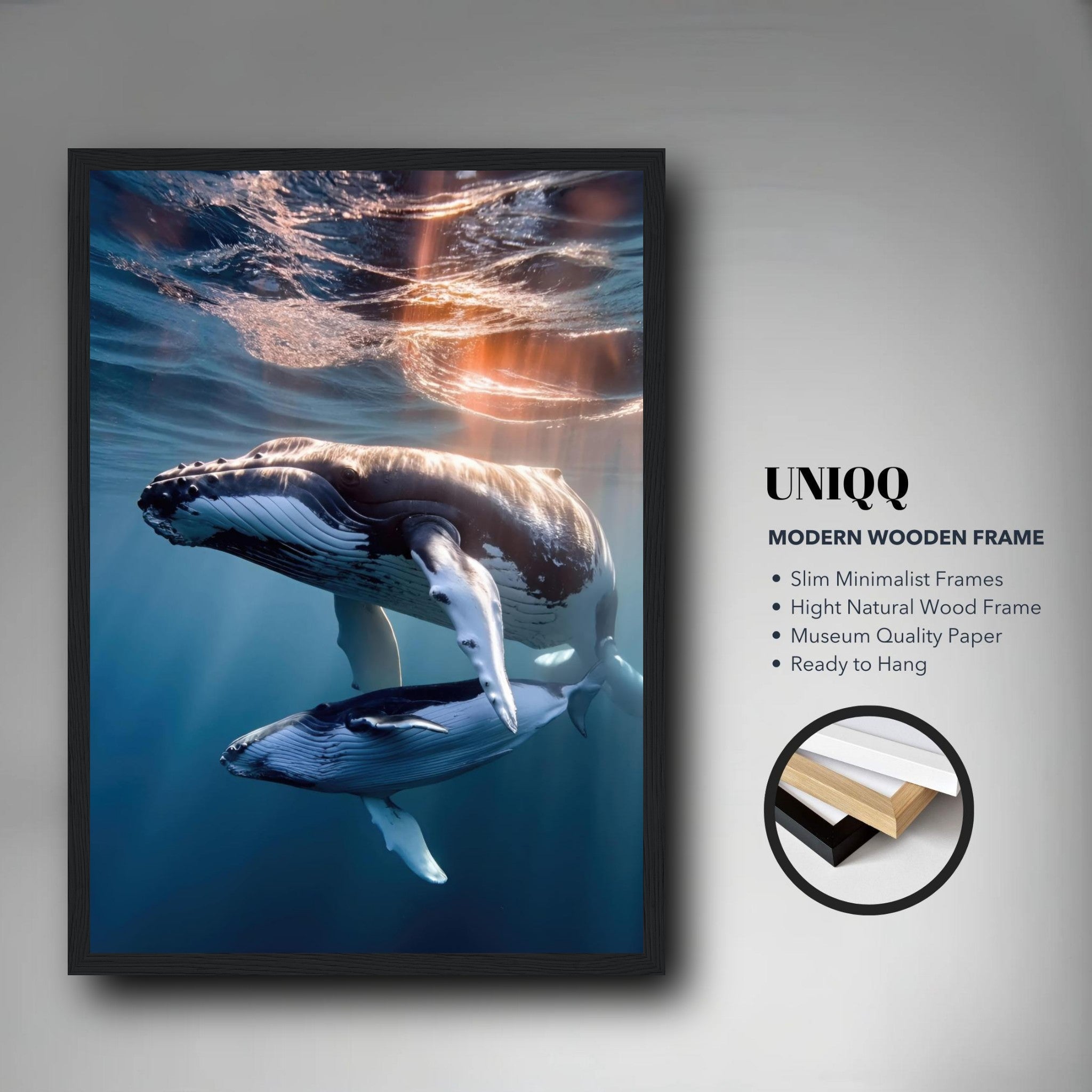 Framed print of a humpback whale and calf swimming in clear ocean waters, showcasing underwater photography.
