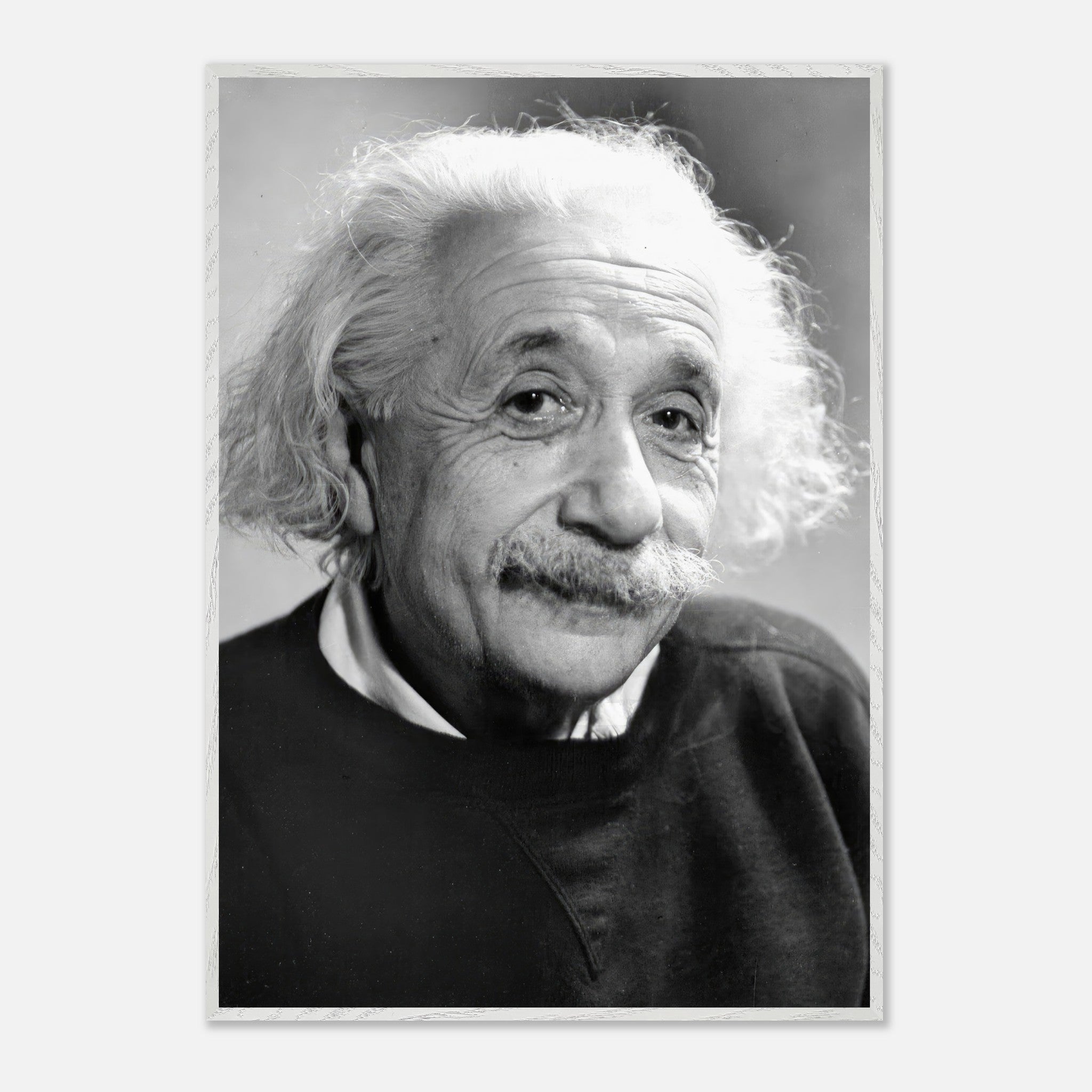 Black-and-white portrait of Albert Einstein from 1946, showcasing his expressive eyes and iconic hair.