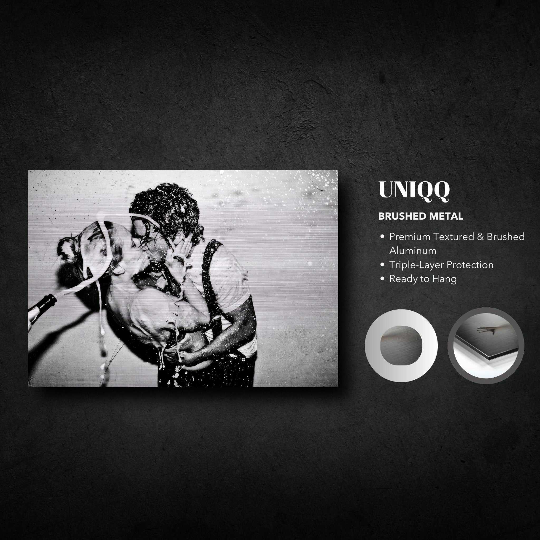Brushed metal art print of Johnny Depp and Kate Moss kissing, showcasing raw passion and glamour.