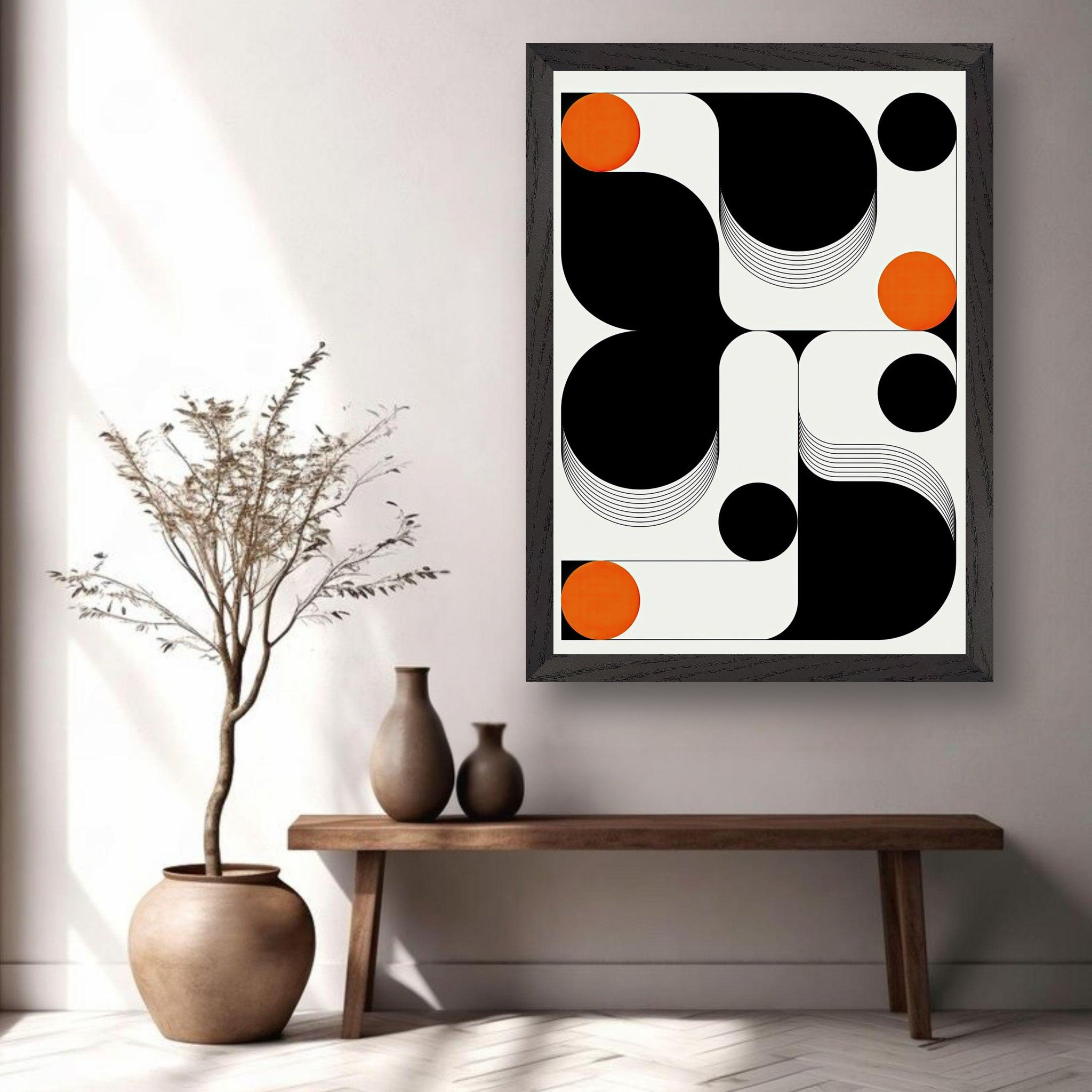 Modern geometric abstract art vintage framed print with bold black, white shapes and vibrant orange circles.