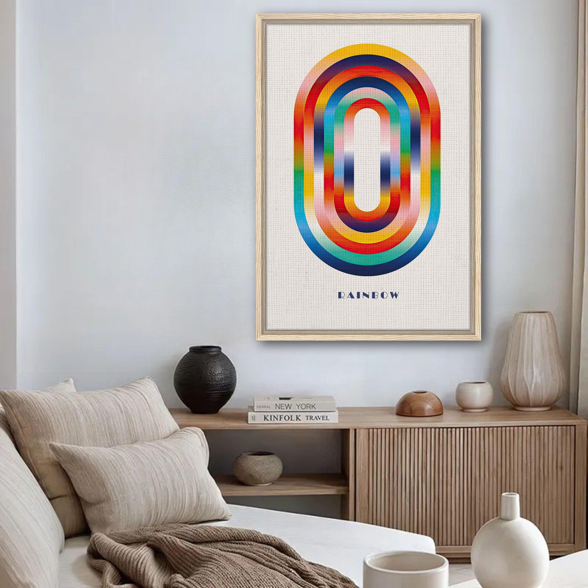 Framed abstract rainbow geometric art print in modern living room setting, showcasing vibrant curves and colors.