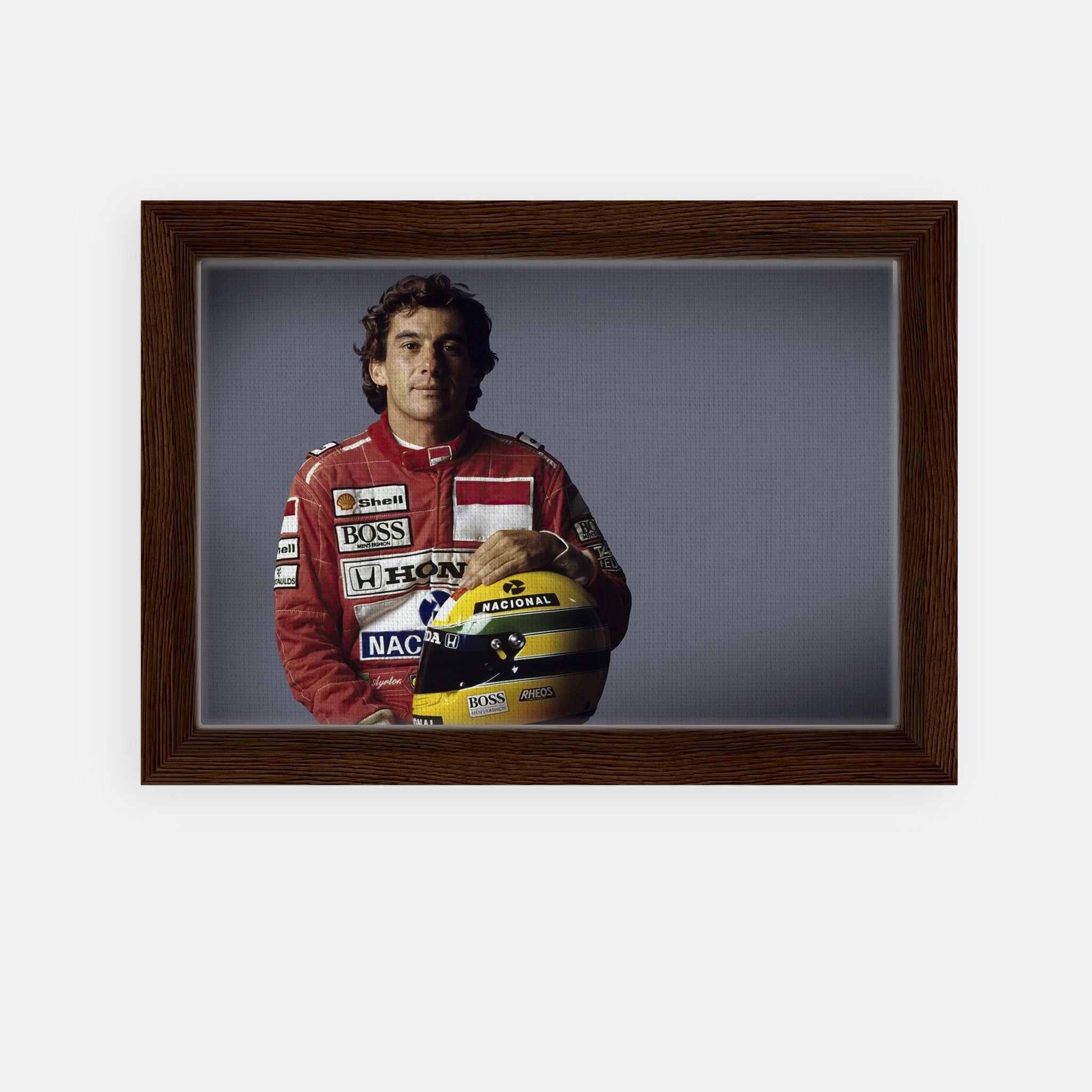Ayrton Senna framed canvas print, showcasing the legendary driver with his helmet, perfect for motorsport fans.