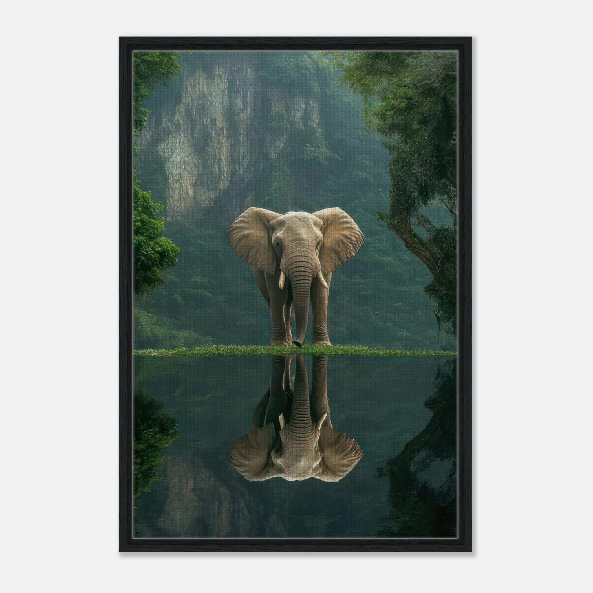 Framed canvas print of a serene jungle elephant near reflective water, surrounded by lush greenery and cliffs.