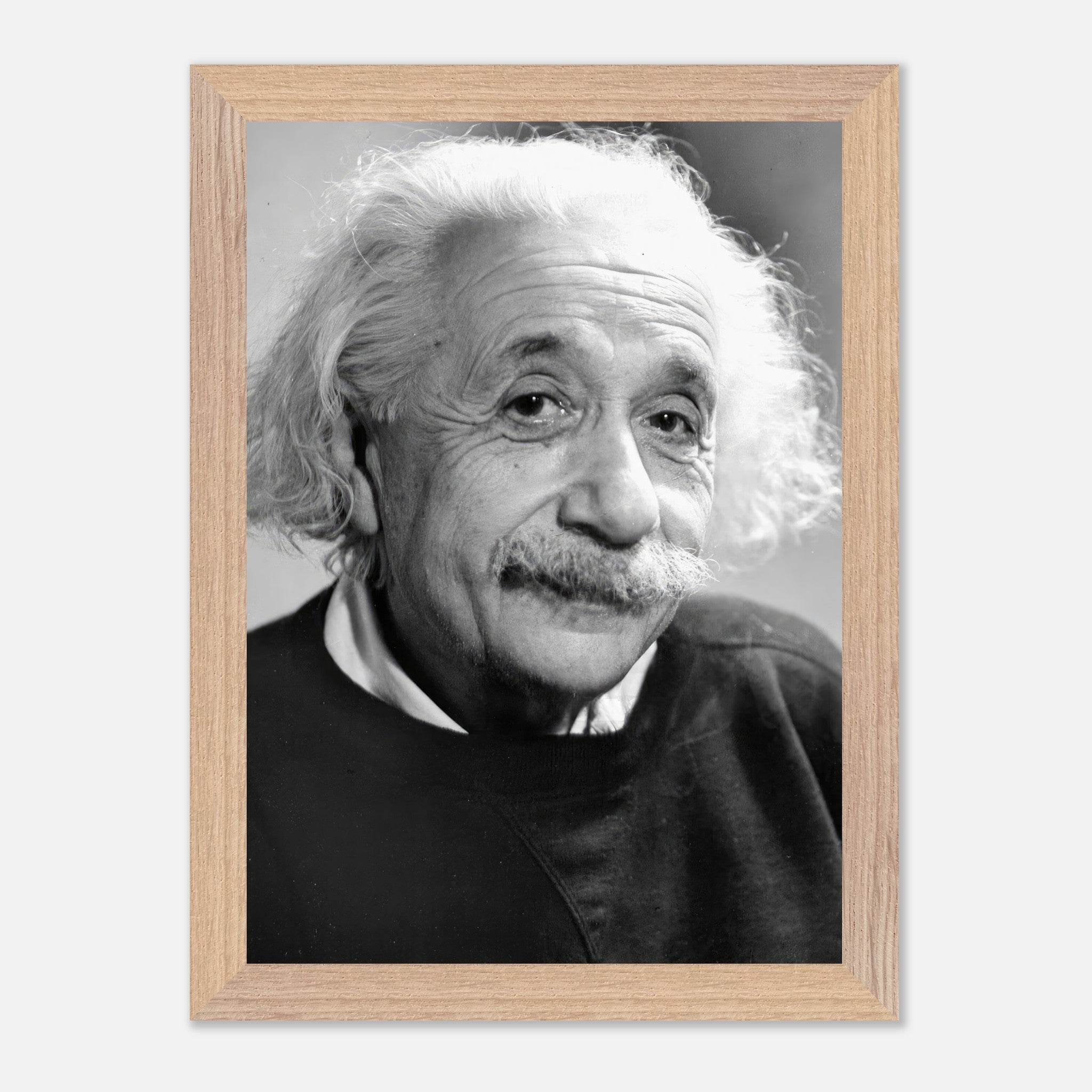 Vintage framed print of Albert Einstein from 1946, showcasing a warm black-and-white portrait.