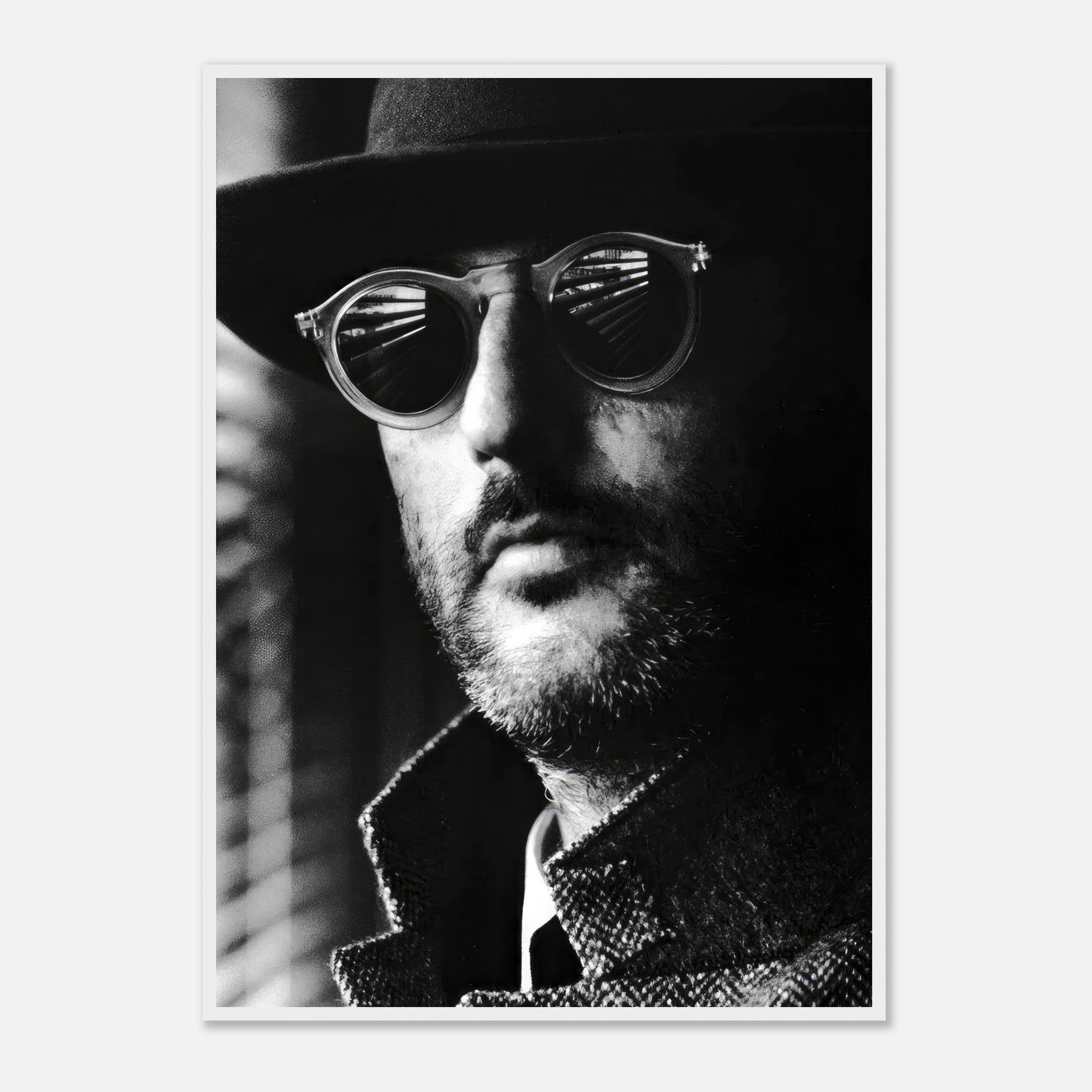 Jean Reno Leon Photography Framed Print featuring a mysterious man in sunglasses and a hat, black-and-white artwork.