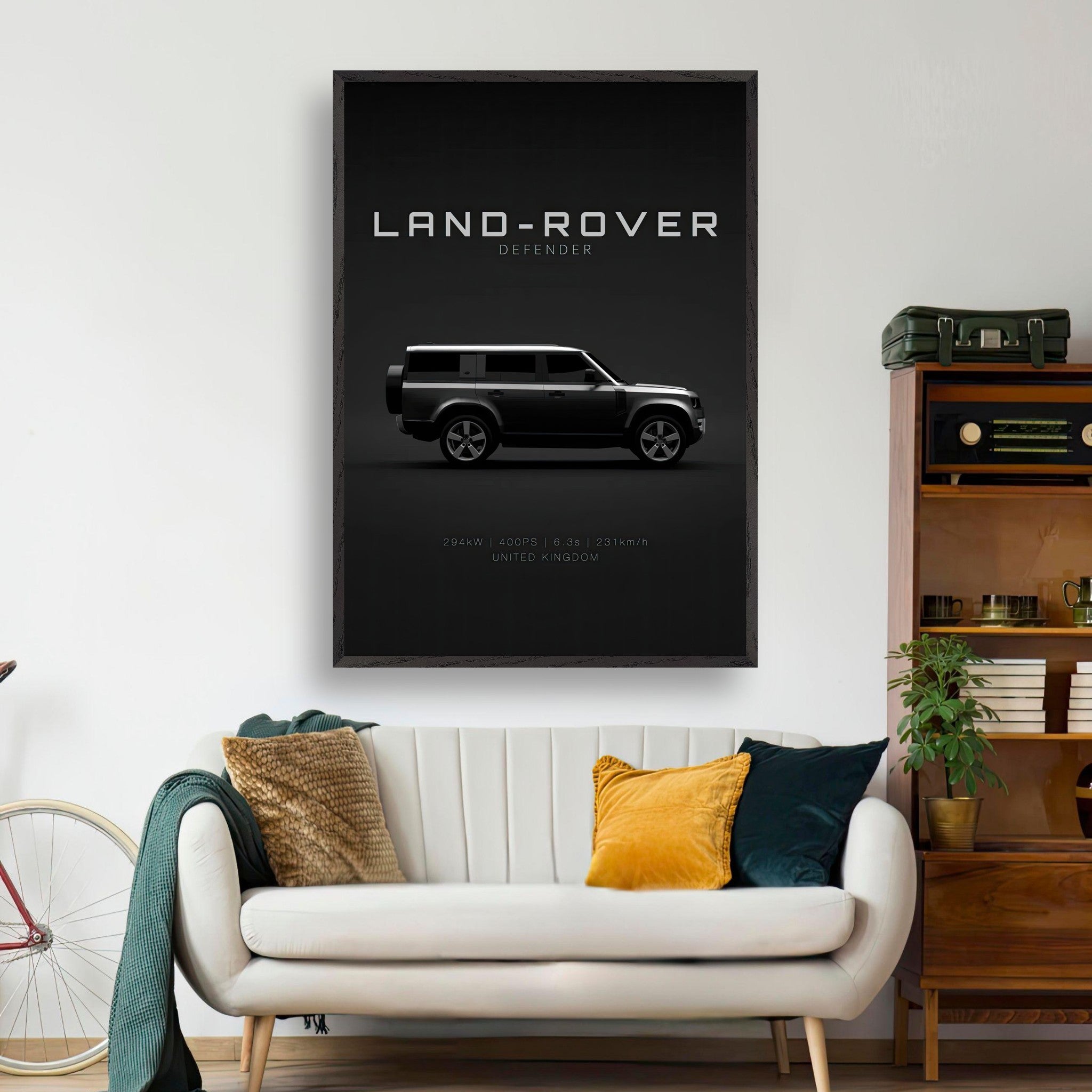 Land Rover Defender vintage framed art in a minimalist design displayed on a wall above a modern sofa.