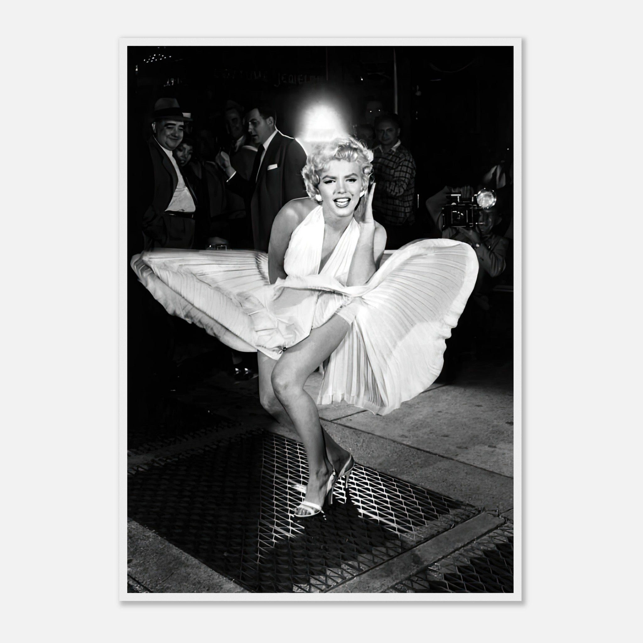 Marilyn Monroe in white dress over subway grate, iconic wind-blown moment, framed print capturing Hollywood elegance.