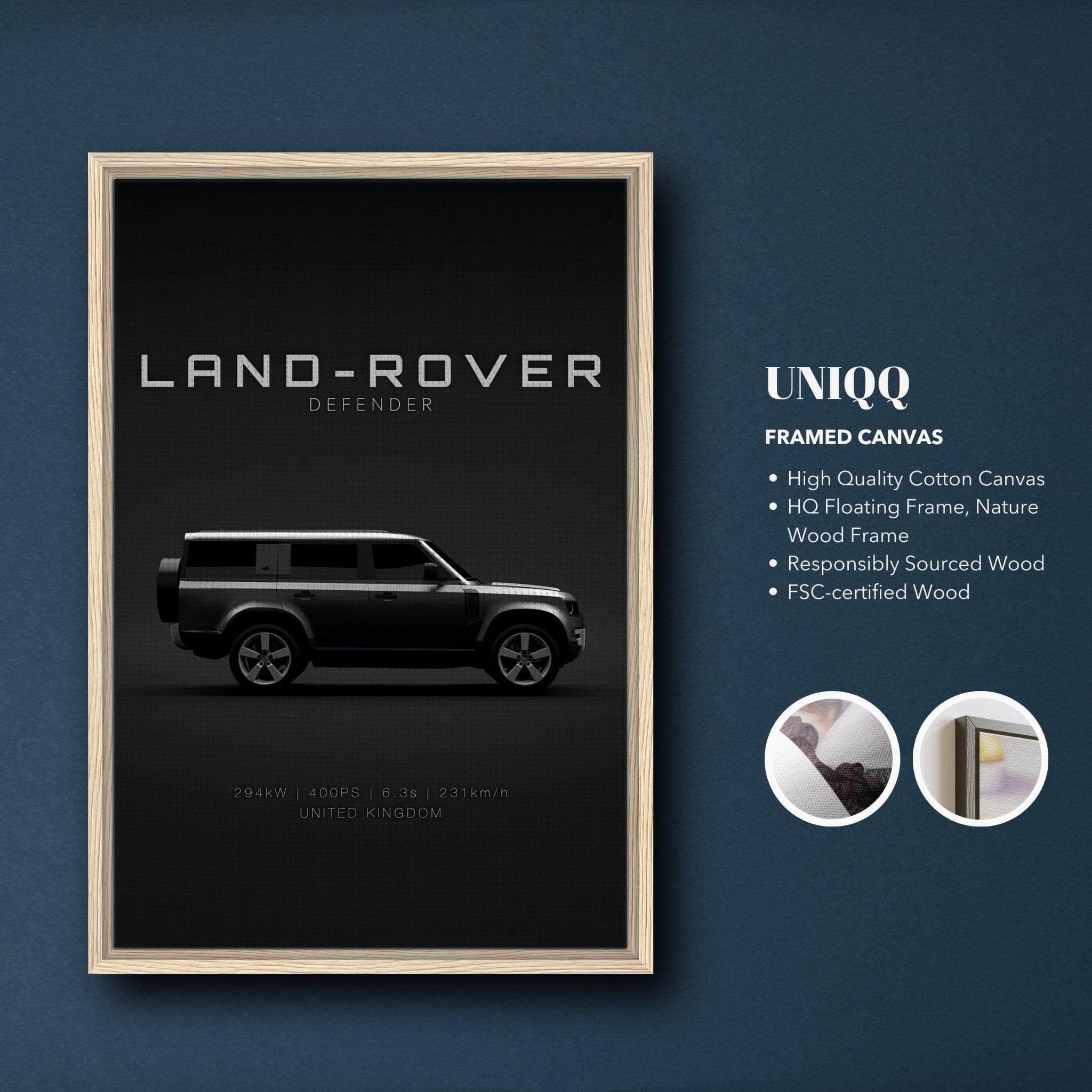 Framed canvas print of Land Rover Defender showcasing sleek design on black background, with natural Wood frame.