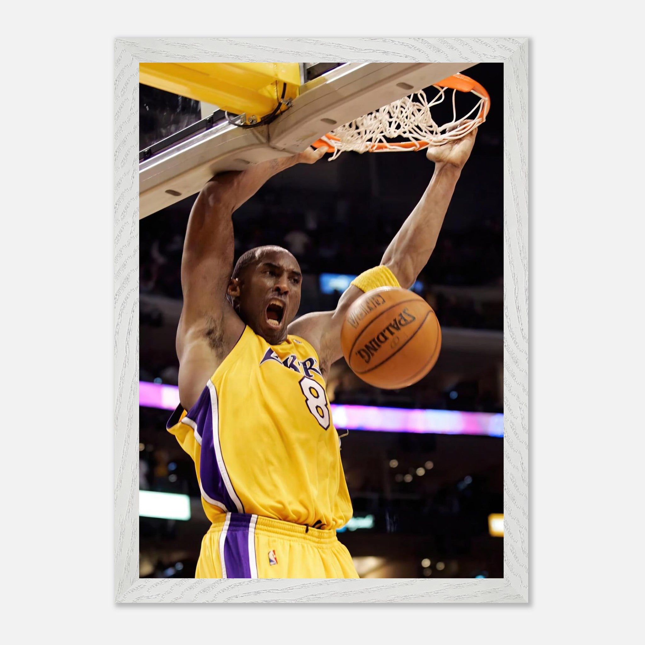 Kobe Bryant soaring for a slam dunk in a yellow Lakers jersey, framed vintage print showcasing his athleticism.