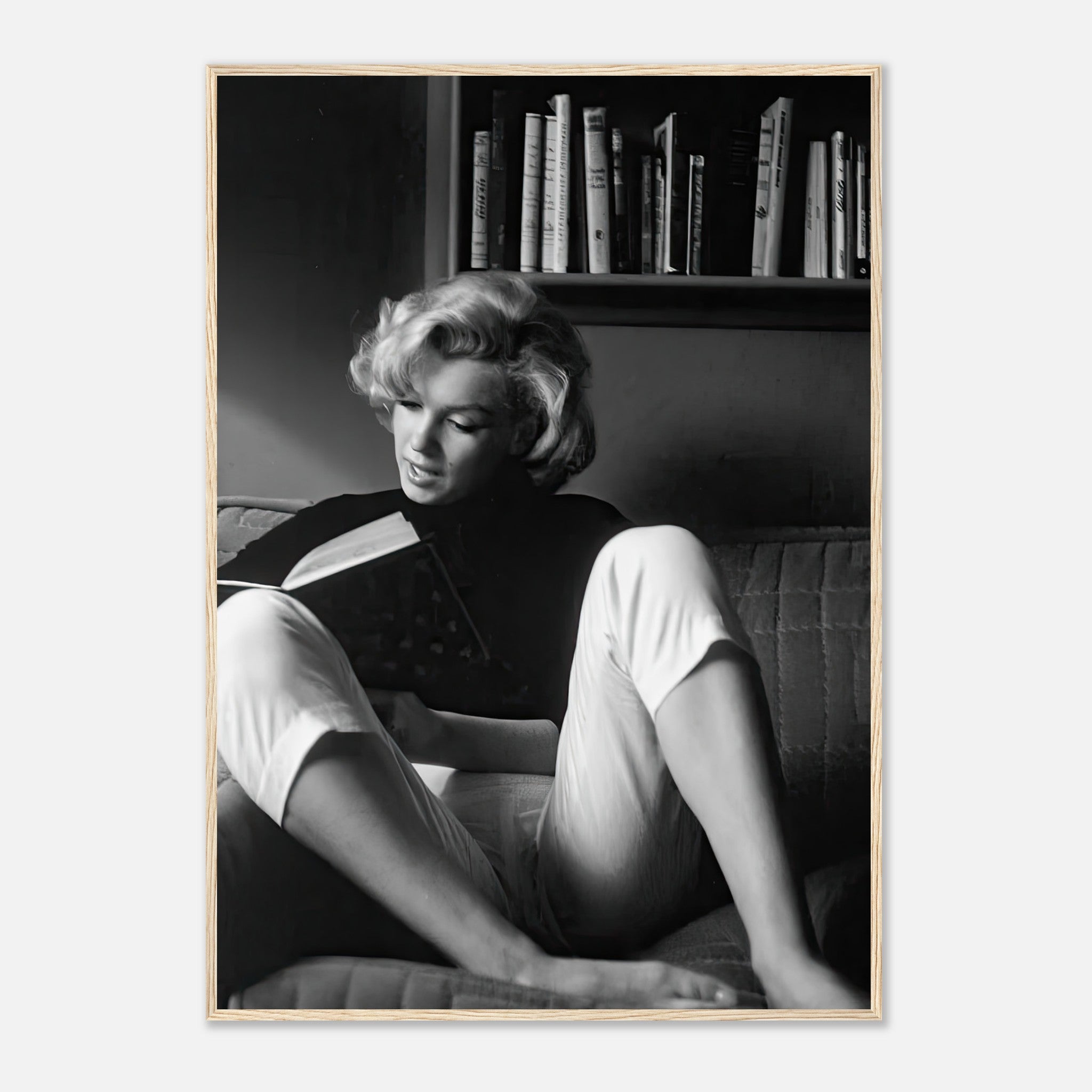 Marilyn Monroe framed print reading at home, showcasing her elegance and classic Hollywood charm.