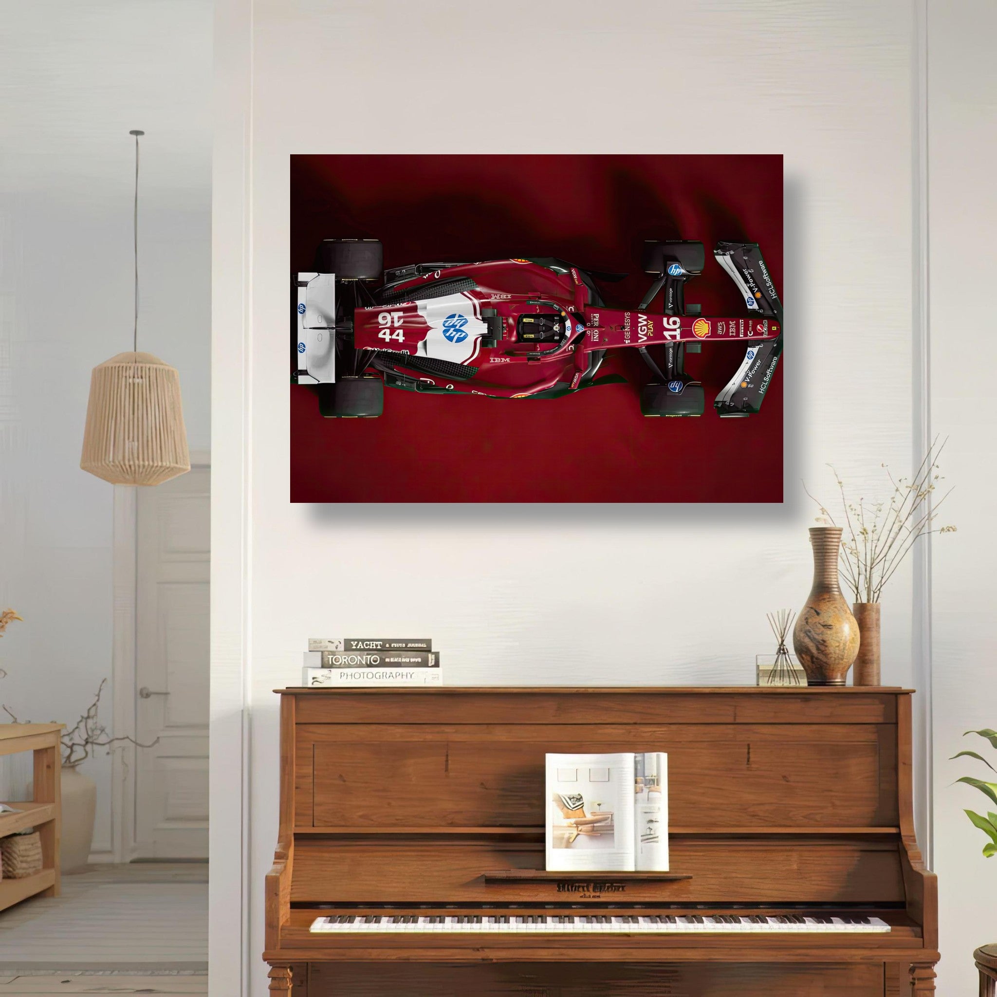 Ferrari F1 2025 poster showcased above a piano, highlighting its sleek design and vibrant colors in a modern interior.