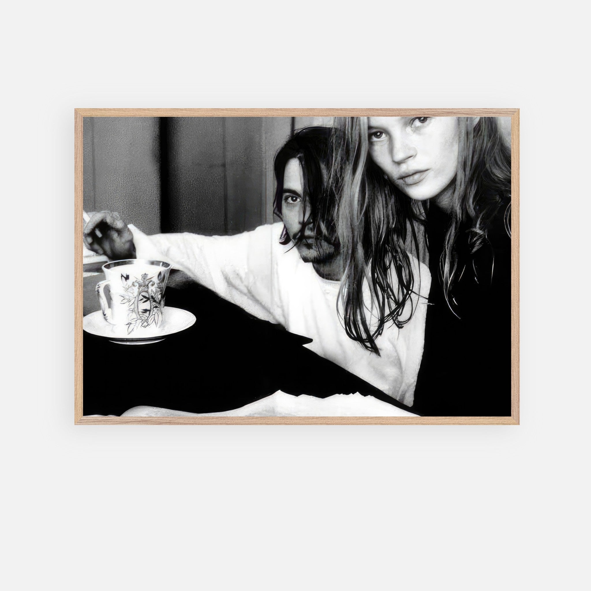 Vintage framed art print of Johnny Depp and Kate Moss, capturing 90s rebellion and romance.