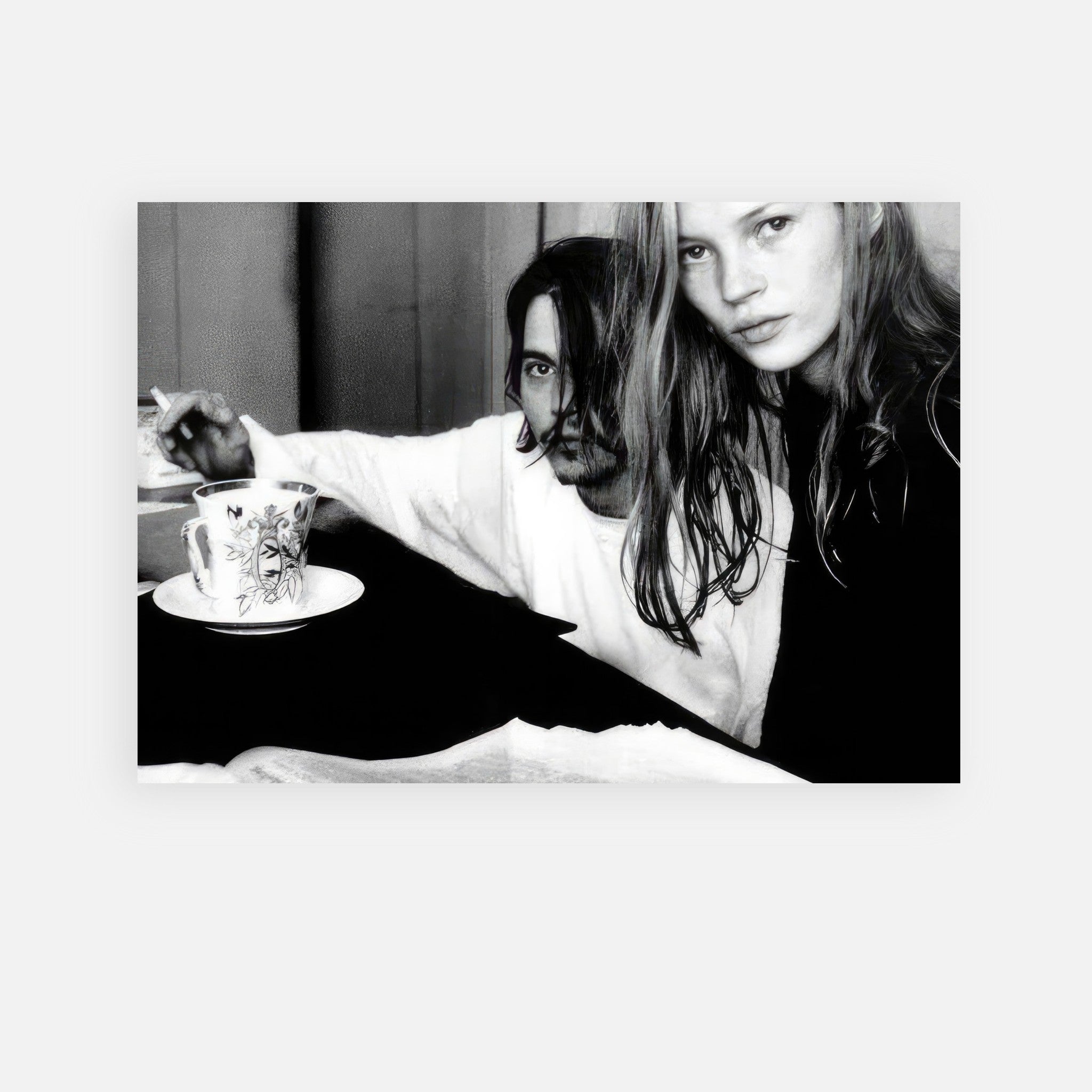 Johnny Depp and Kate Moss black-and-white poster capturing 90s rock-and-roll romance by François-Marie Banier.
