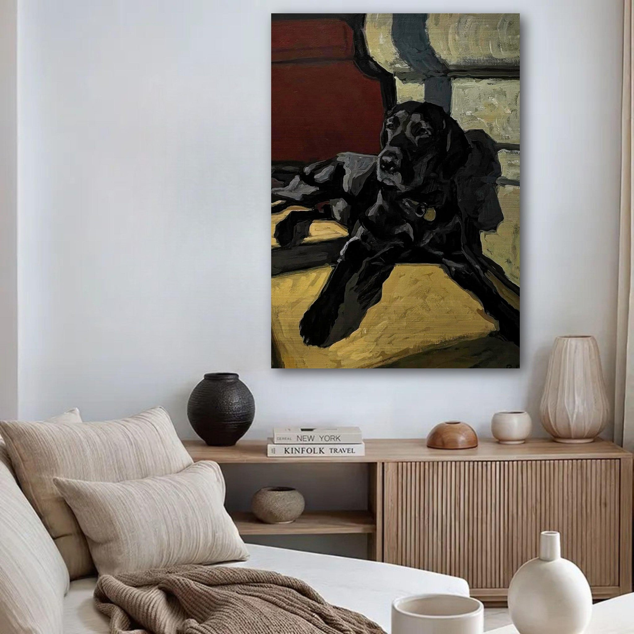 Black Labrador dog painting on brushed metal, showcasing warmth and elegance in a cozy living room setting.