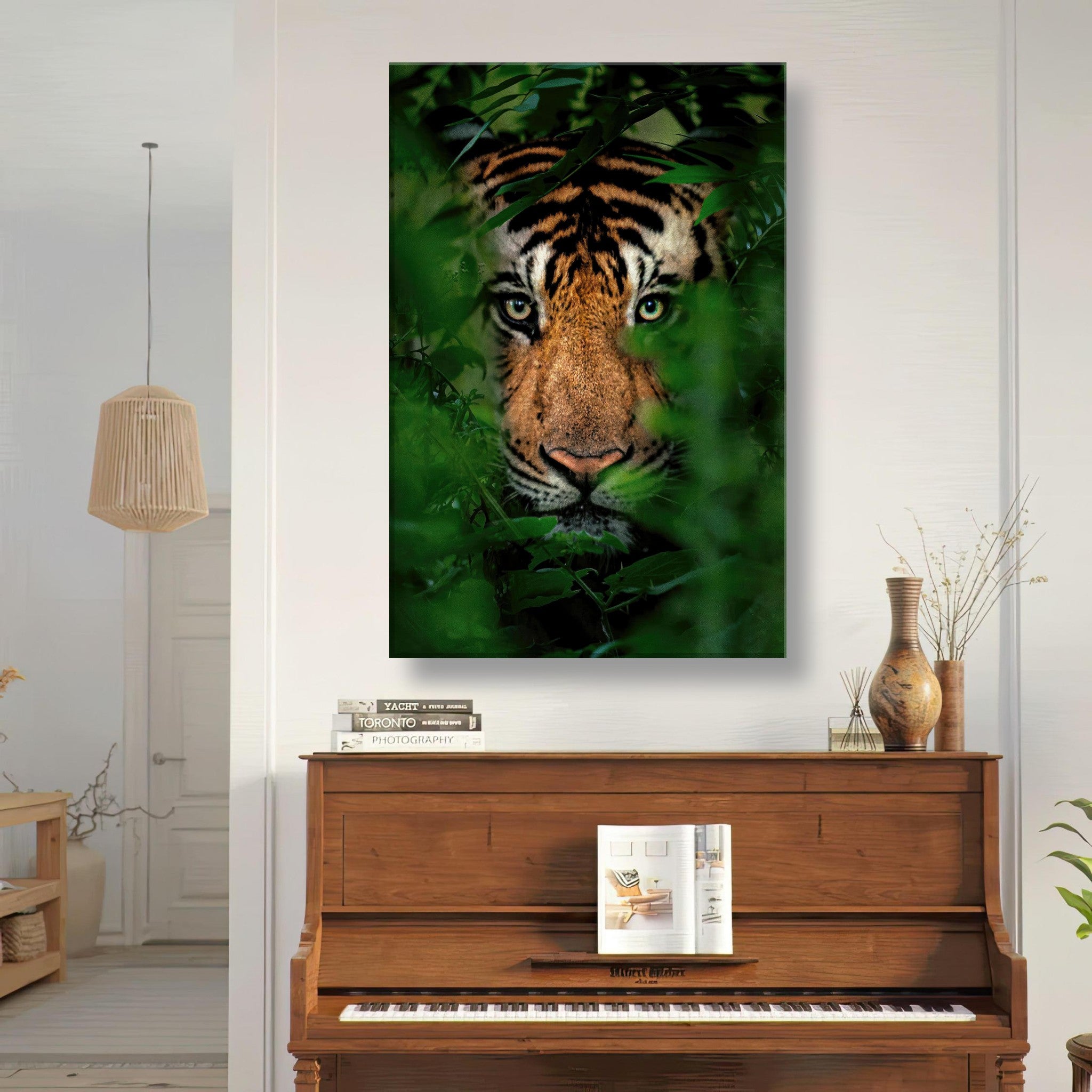 Tiger peering through green foliage in a jungle-themed canvas artwork, enhancing home decor with elegance.