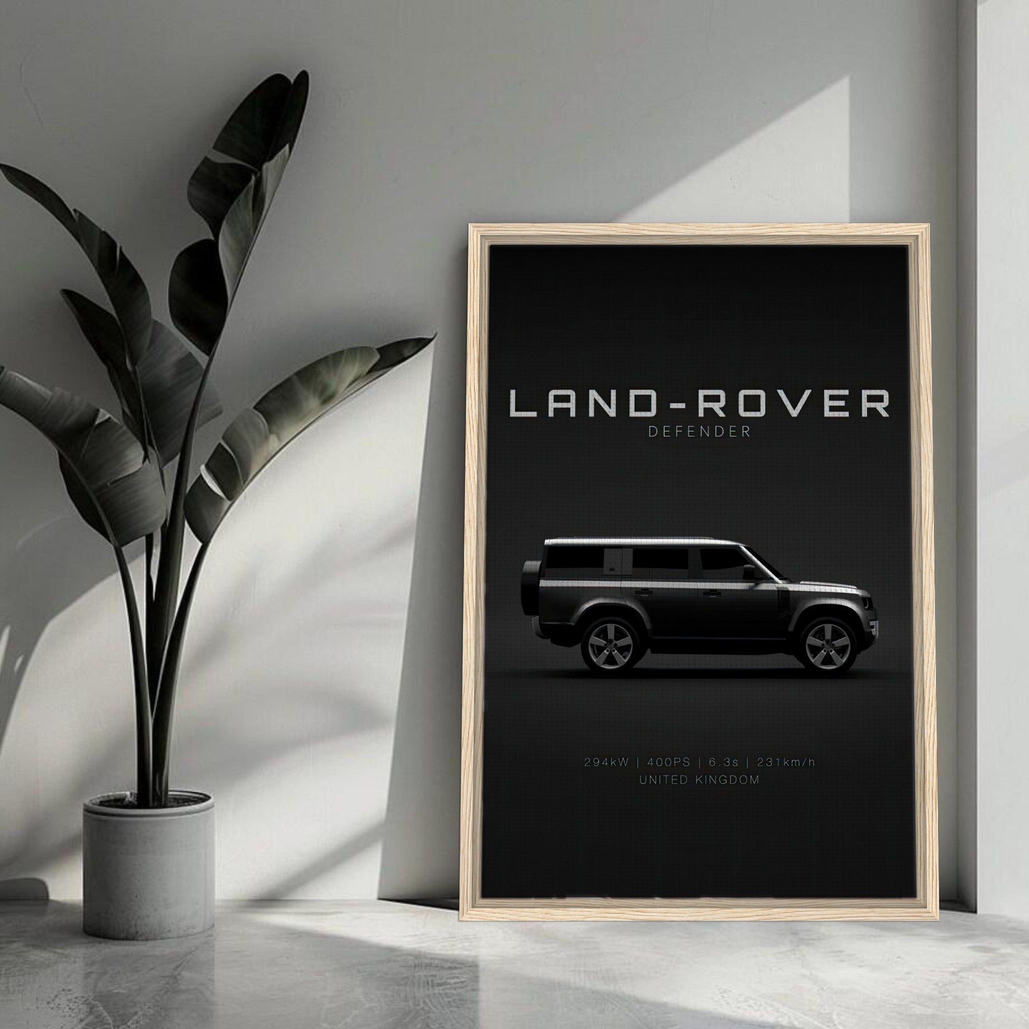 Land Rover Defender framed canvas print showcasing sleek side profile against black backdrop.