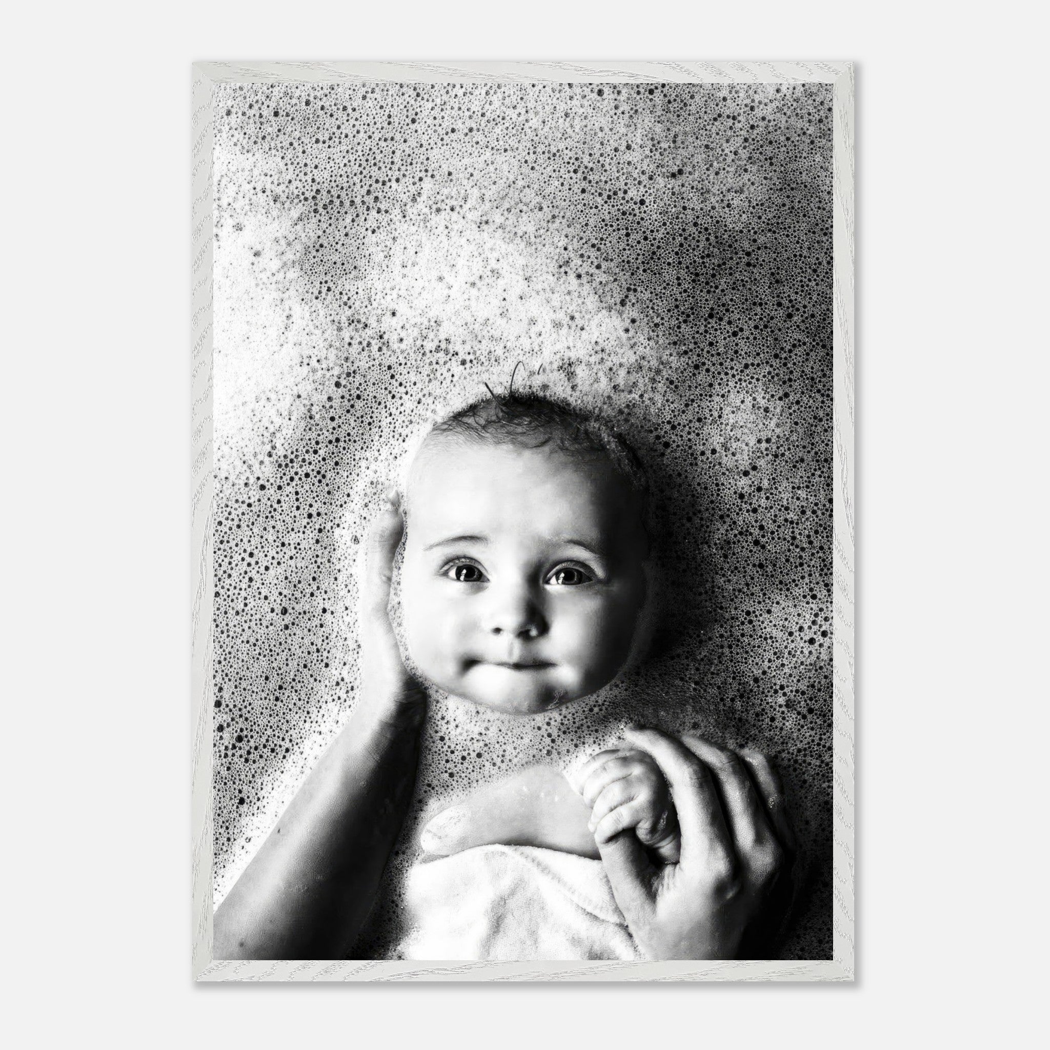 Black and white baby bath photography vintage framed print, capturing innocence in delicate bubbles.