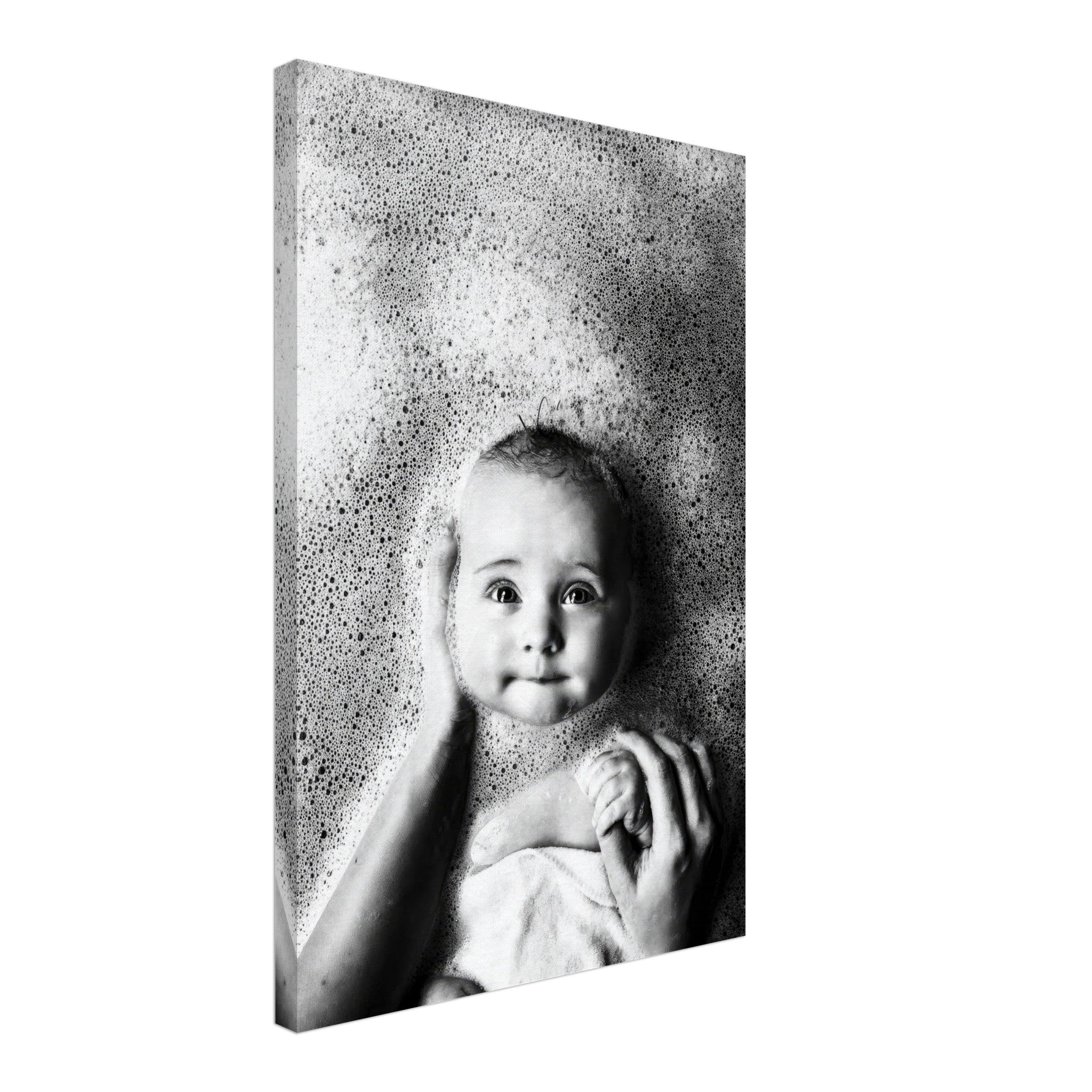 Black-and-white canvas print of a baby in bath foam, capturing innocence and joy during bath time.
