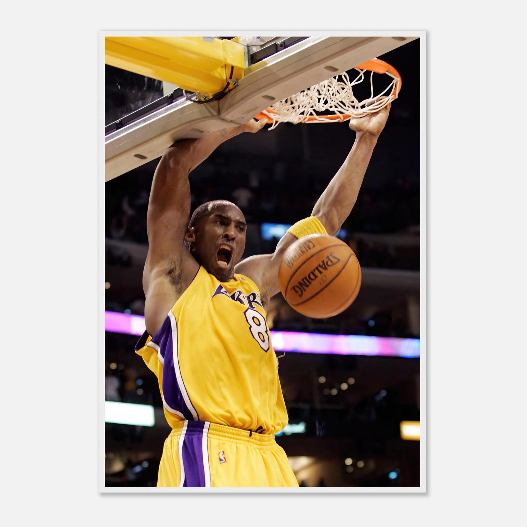 Kobe Bryant's iconic slam dunk in Lakers colors, capturing his legendary intensity and athleticism in a framed print.