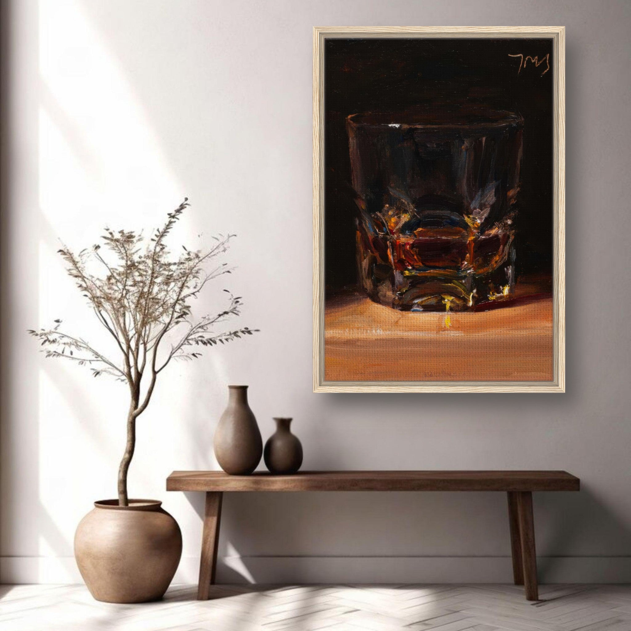 Whiskey framed canvas print showcasing a glass of whiskey in a stylish modern interior setting.