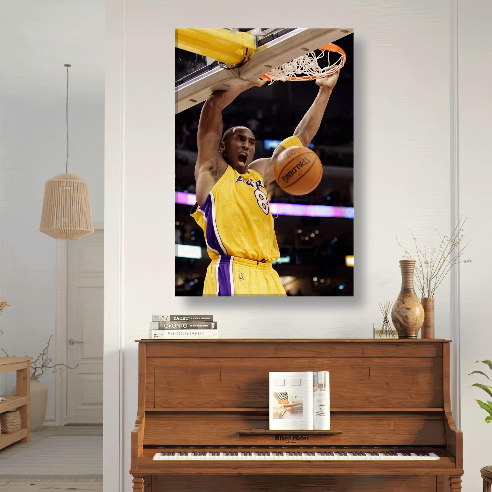 Kobe Bryant's iconic slam dunk canvas print featuring vibrant colors and dynamic action in a modern living space.