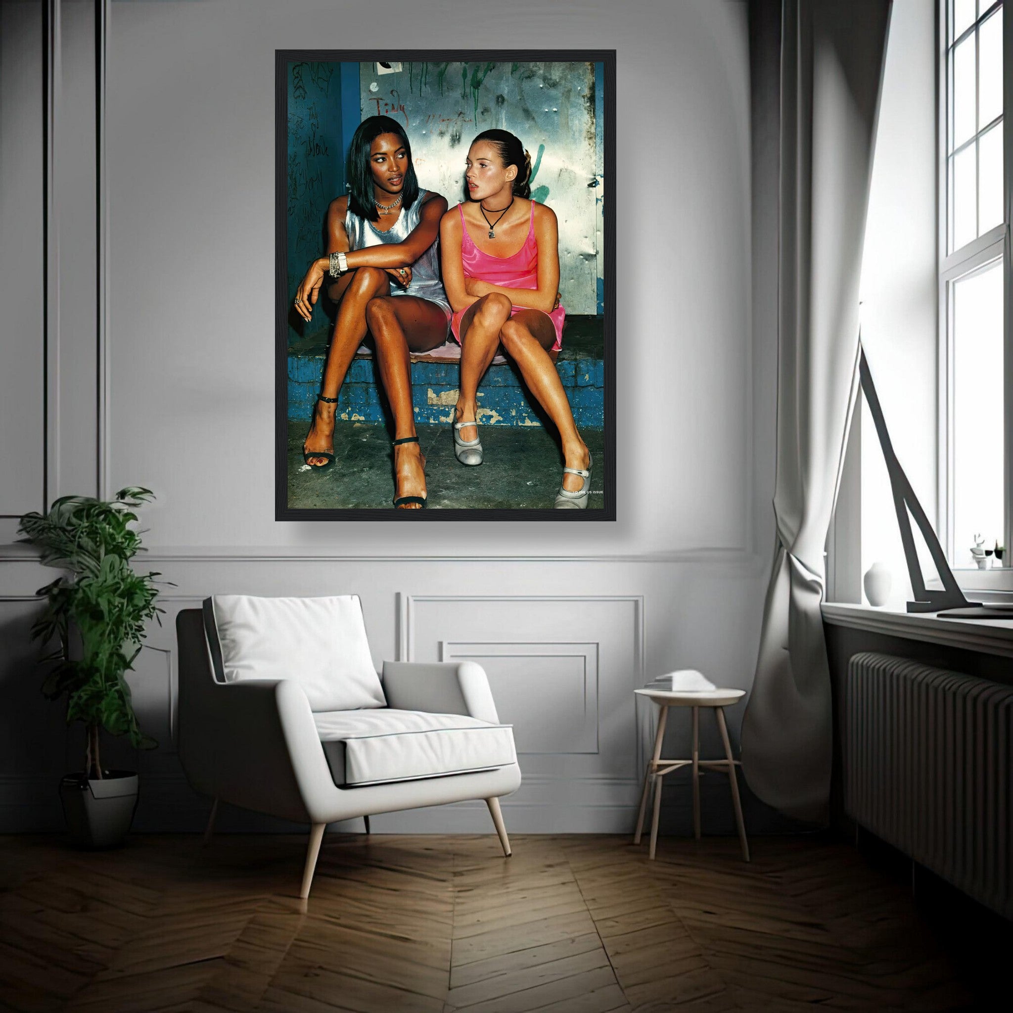 Framed print of Naomi Campbell and Kate Moss embodying 90s fashion in a stylish living room setting.