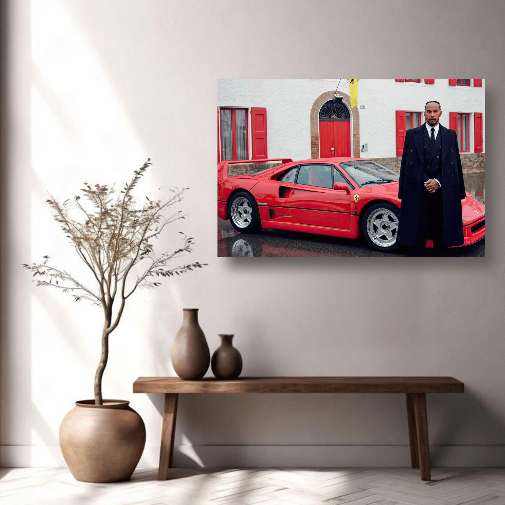 Lewis Hamilton standing beside a red Ferrari F40 at Enzo Ferrari's house, captured in a premium metal print.