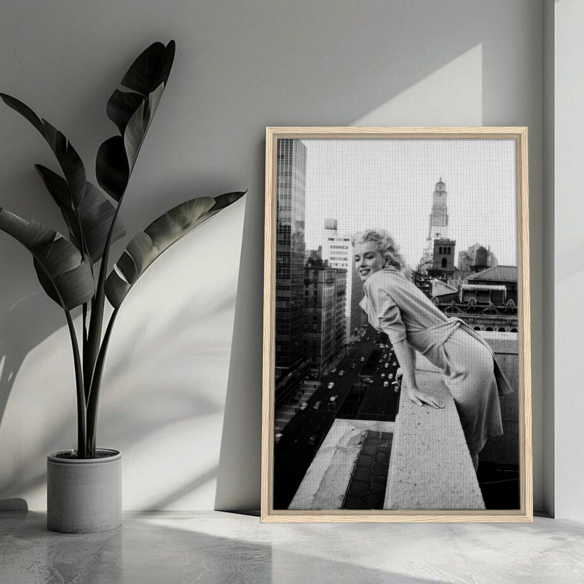 Framed canvas of Marilyn Monroe on New York rooftop, showcasing classic elegance in black-and-white.
