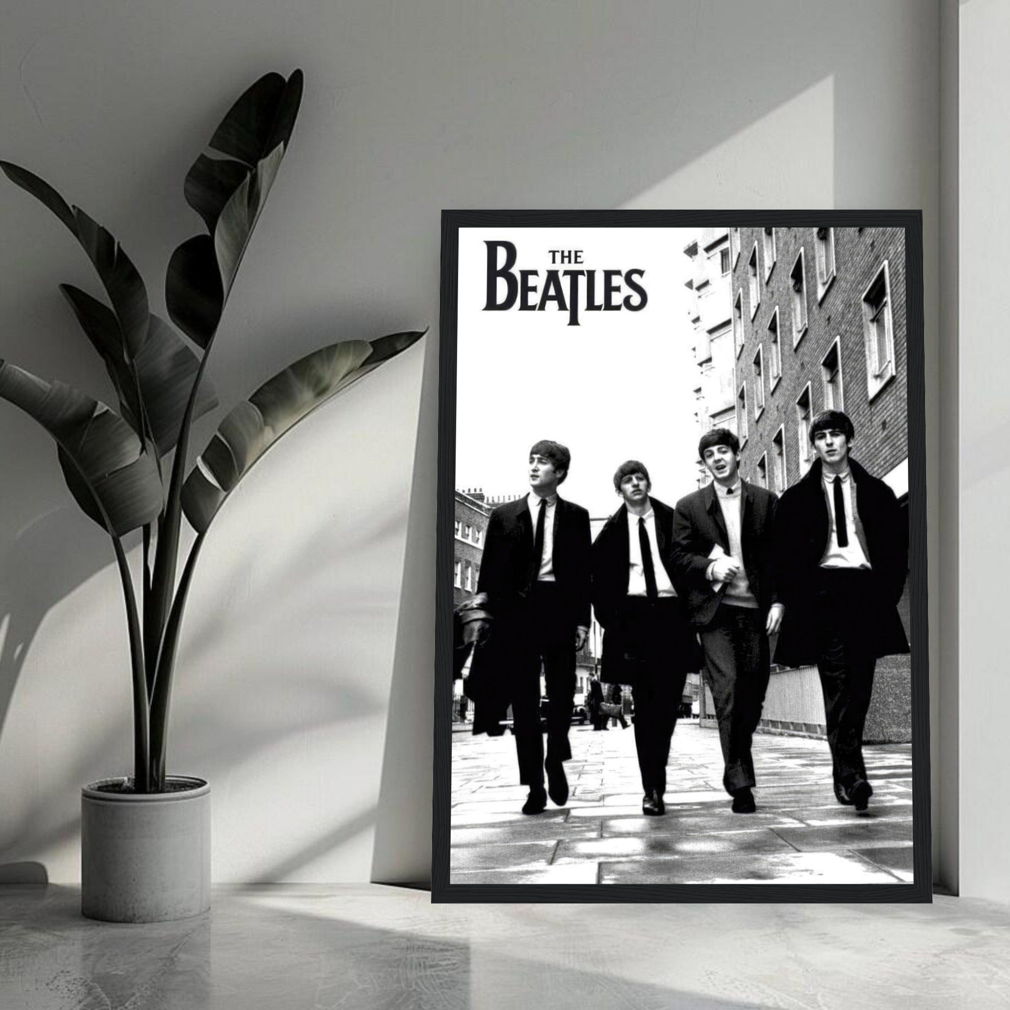 The Beatles Cover framed print featuring the iconic band walking in black and white, perfect for music lovers.