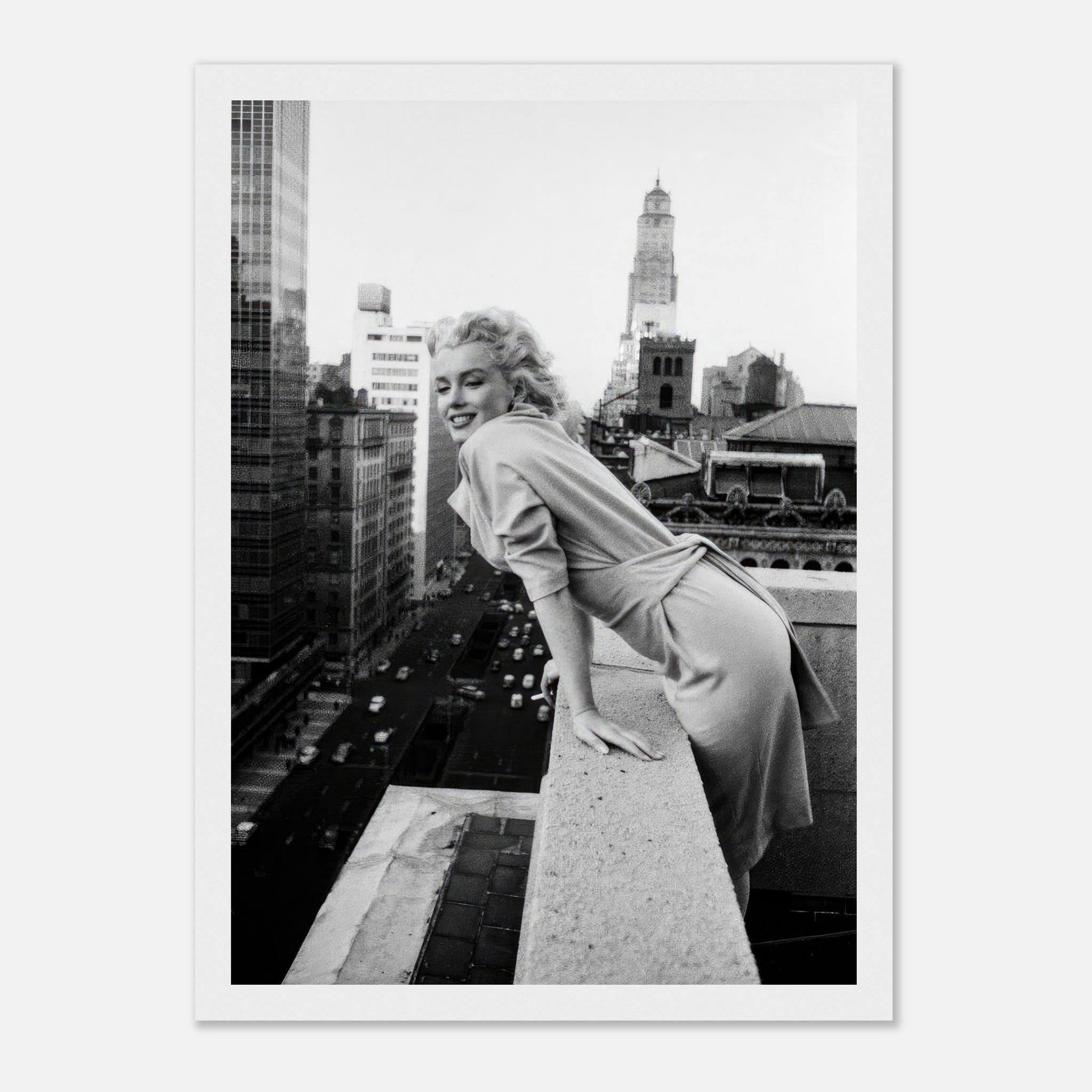 Black-and-white image of Marilyn Monroe smiling on a rooftop overlooking 1950s New York City, framed print.