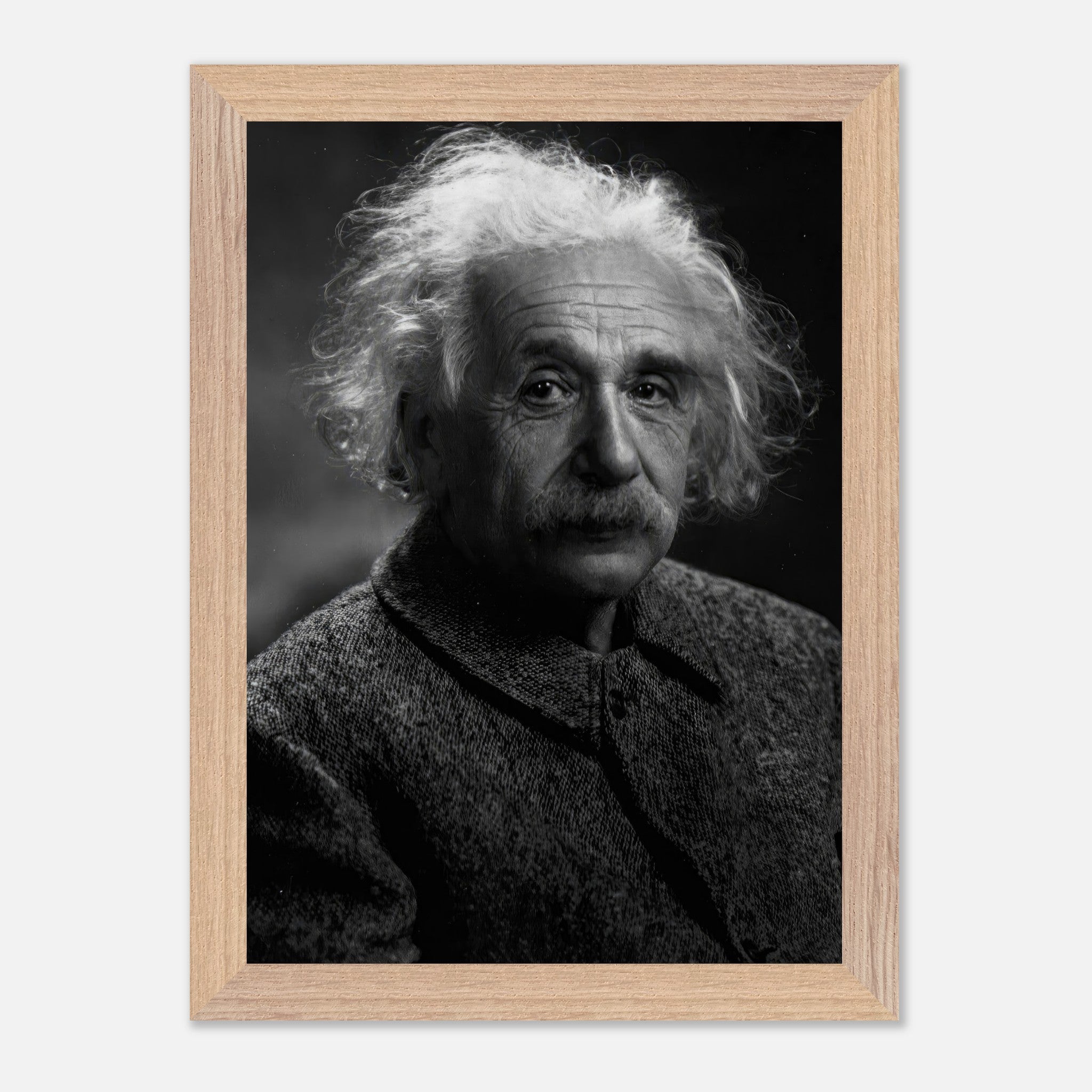 Vintage framed portrait of Albert Einstein, showcasing his wisdom and intellect in black-and-white.
