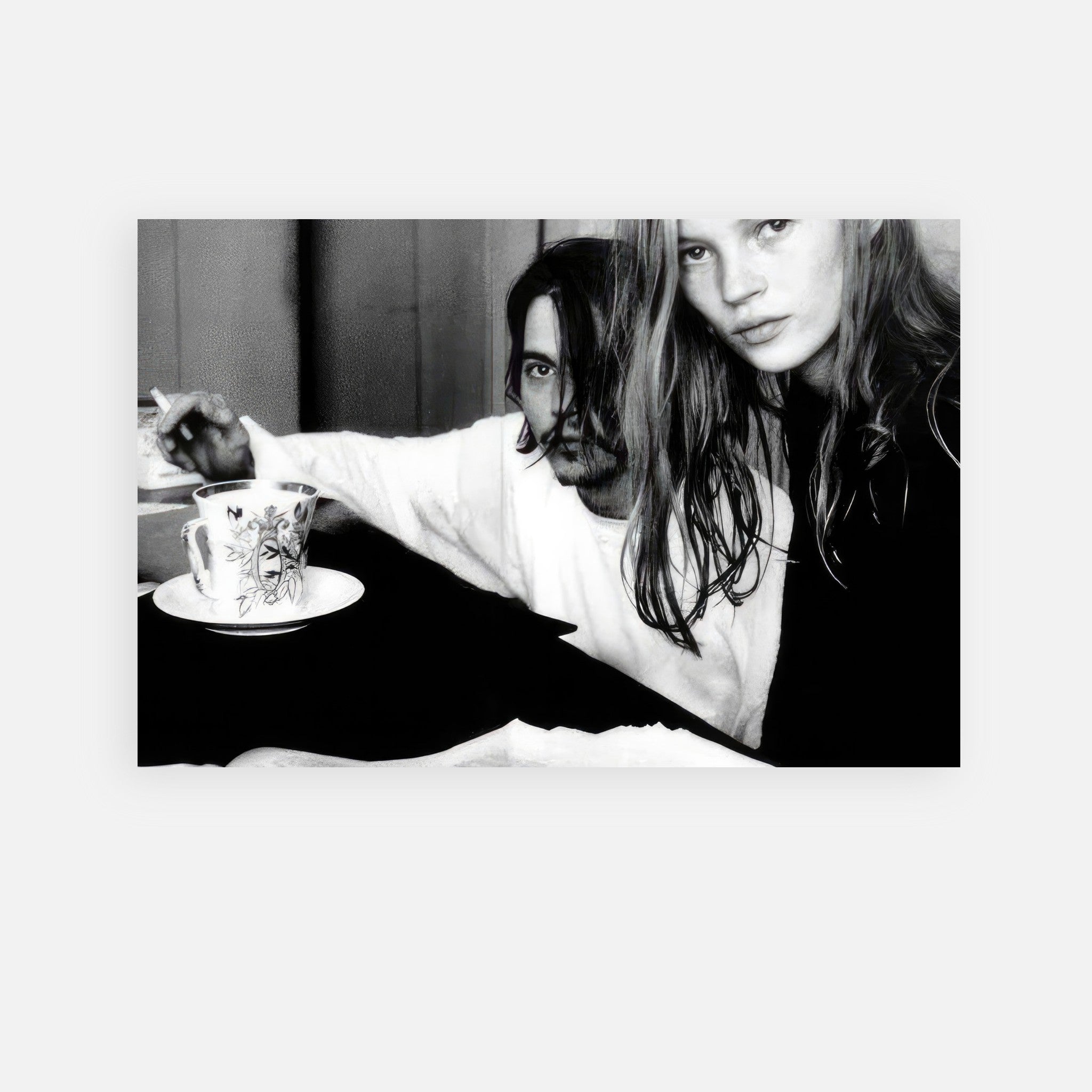 Rebel Romance metal print of Johnny Depp and Kate Moss, capturing 90s style and chemistry in black and white.