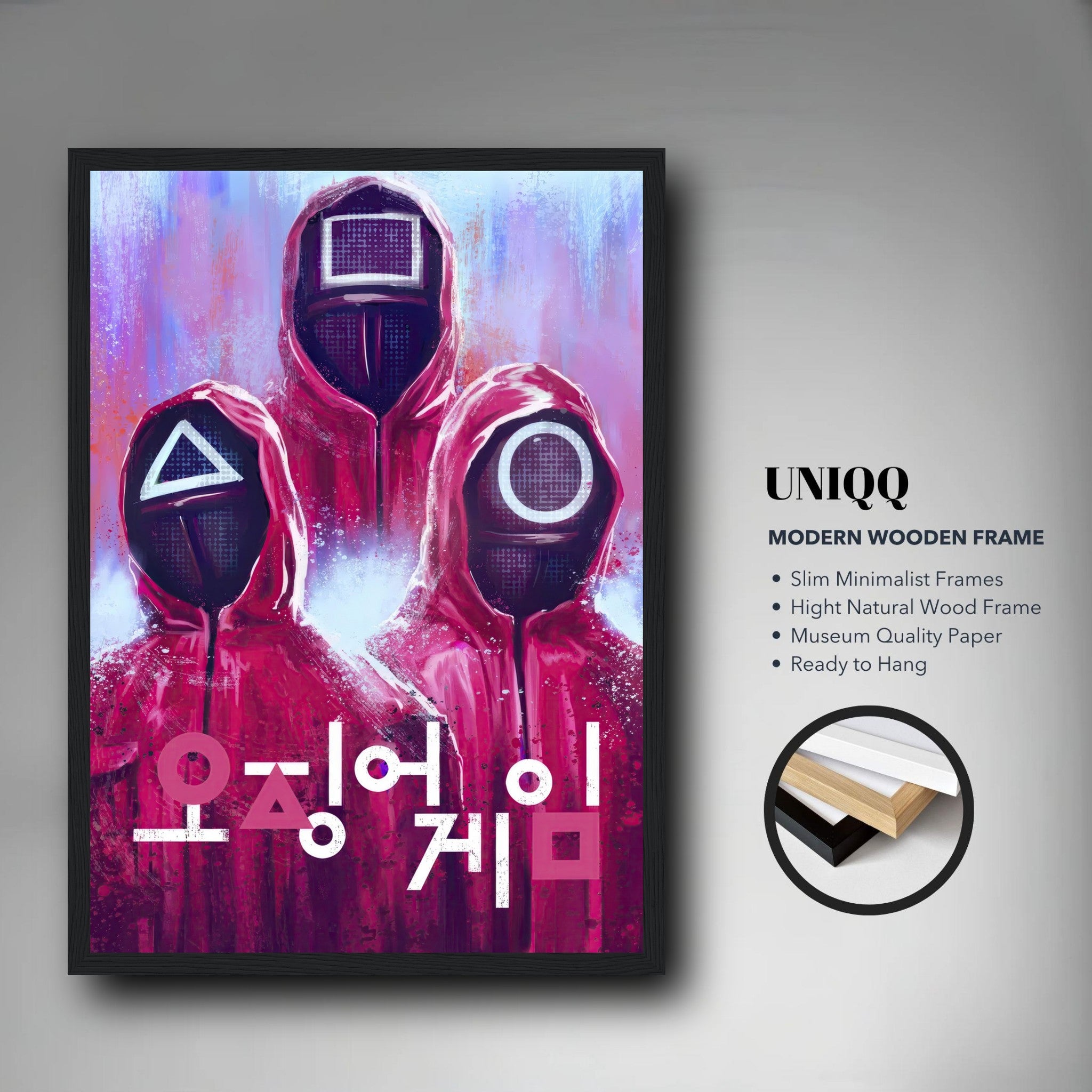 Squid Game framed poster featuring iconic guards in red suits and geometric masks with bold Korean typography.