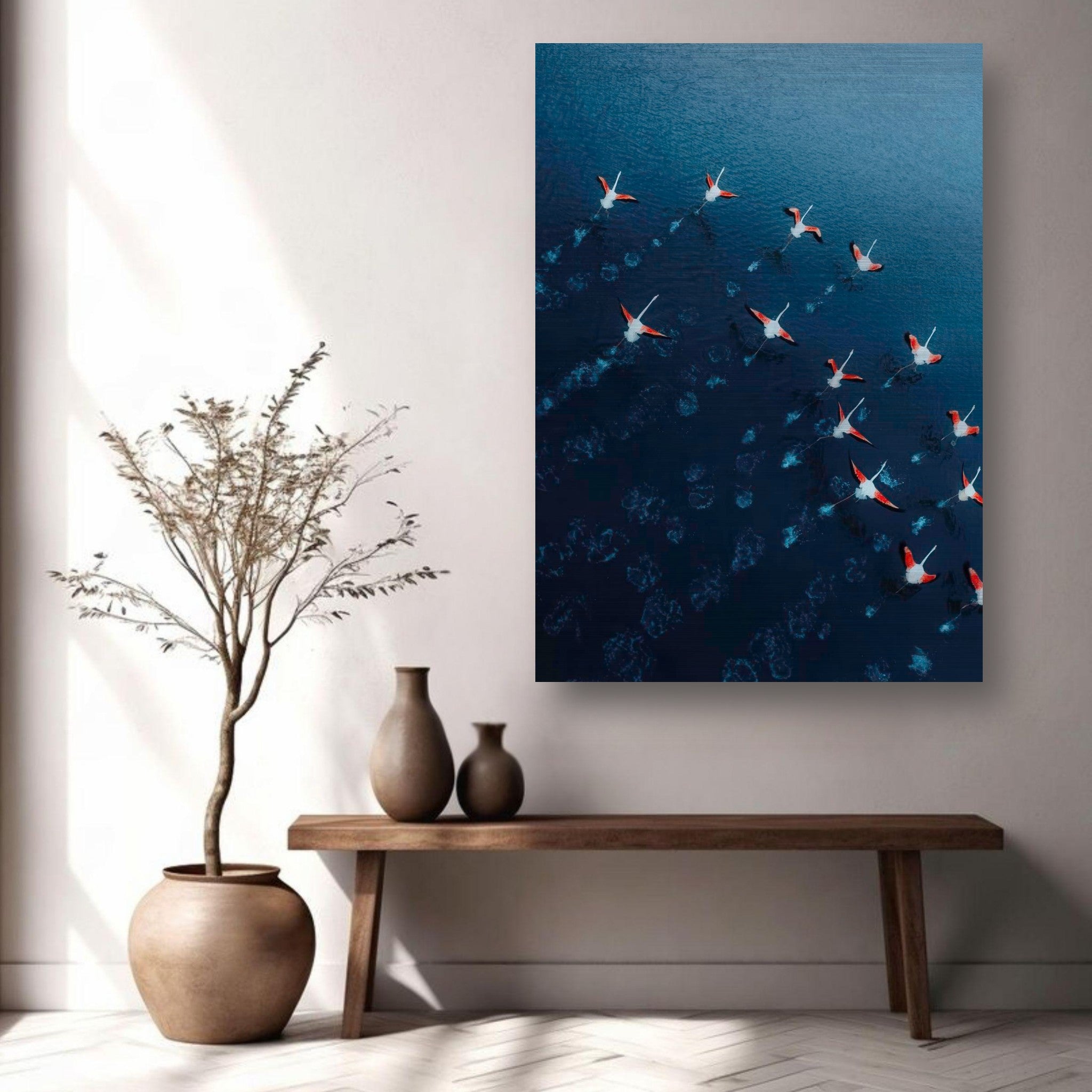 Aerial view of flamingos over deep blue water in a stylish interior setting with modern decor.