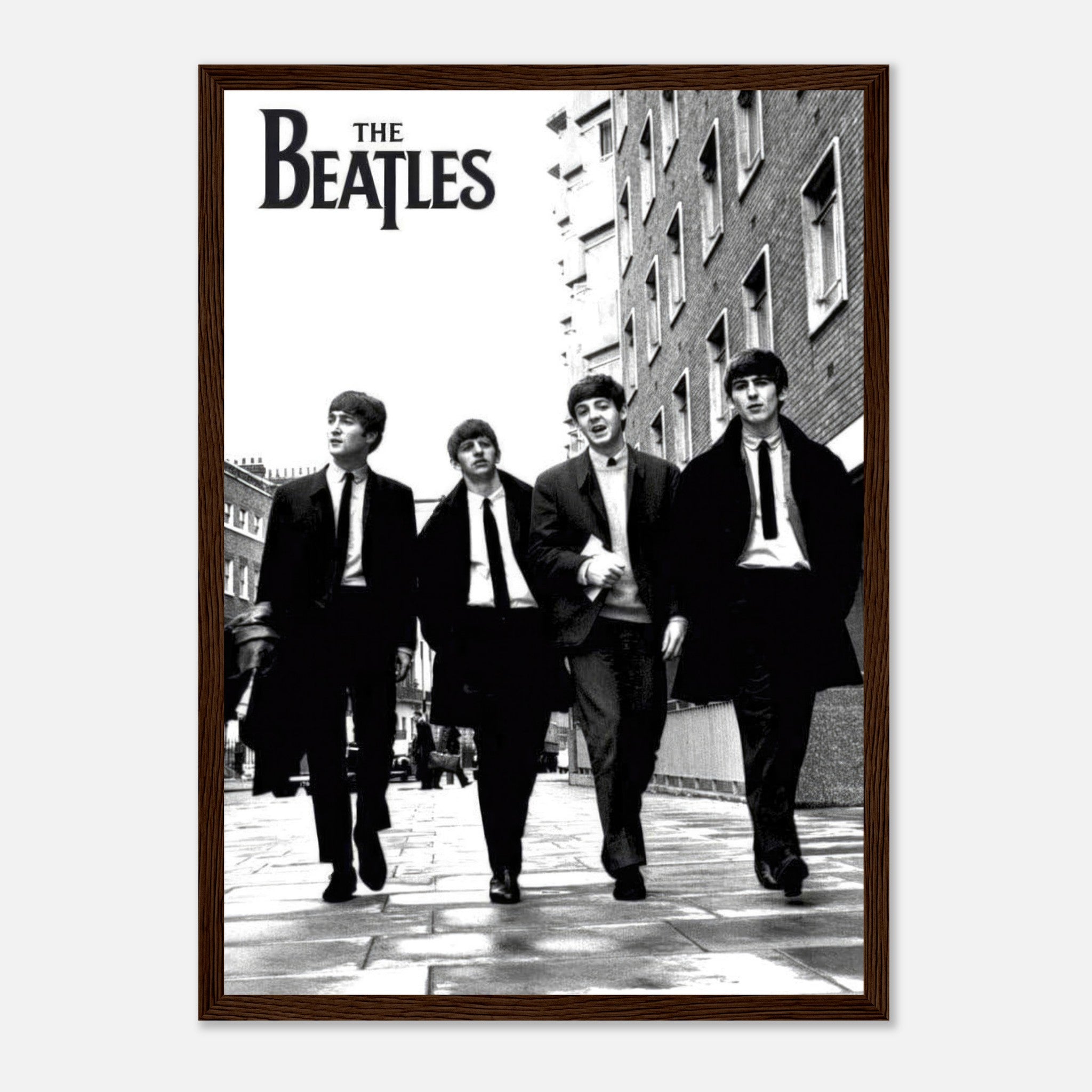 The Beatles Cover Framed Print showcasing the iconic band walking in black and white.