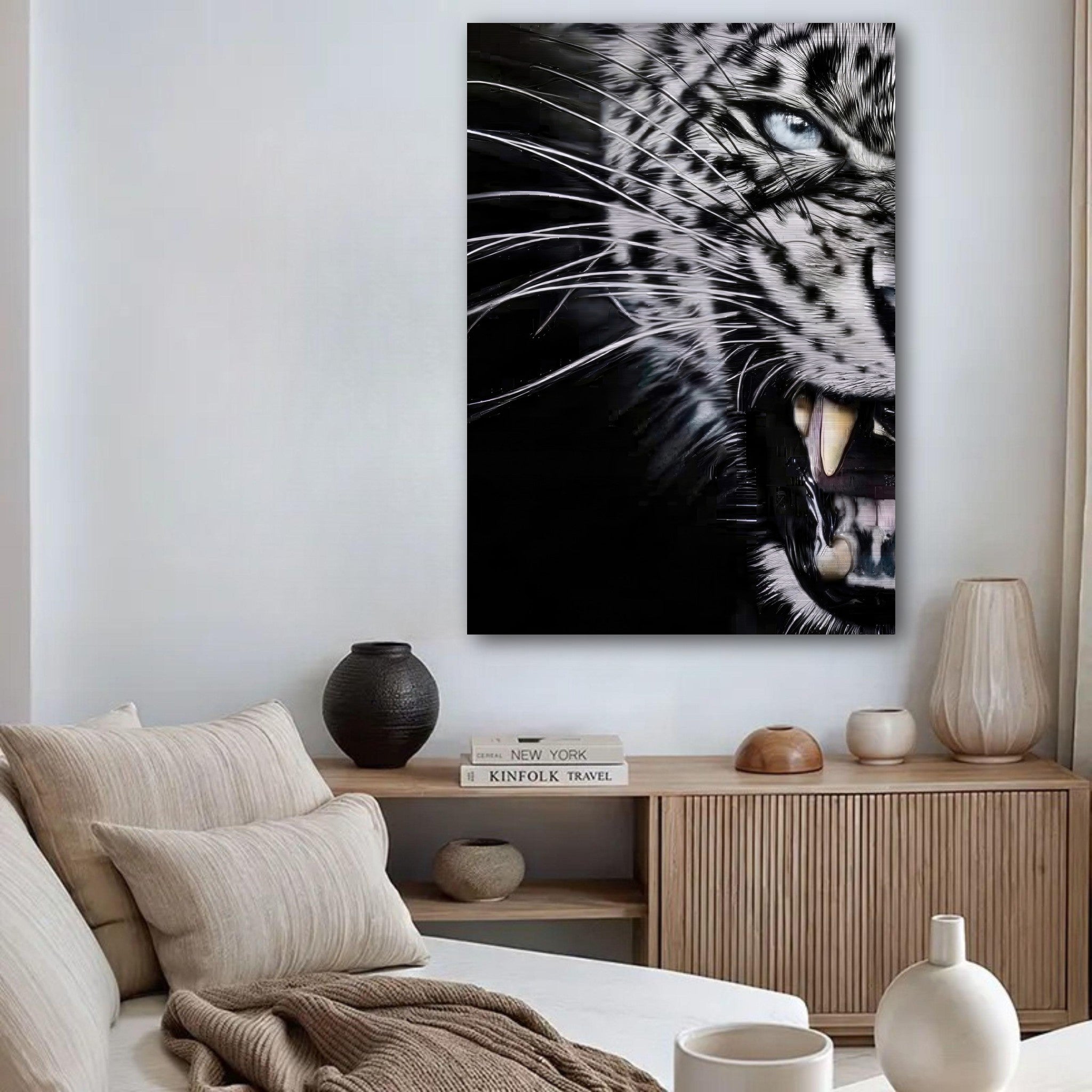 Leopard close-up portrait in brushed metal, showcasing intense eyes and sharp fangs in a modern living room setting.