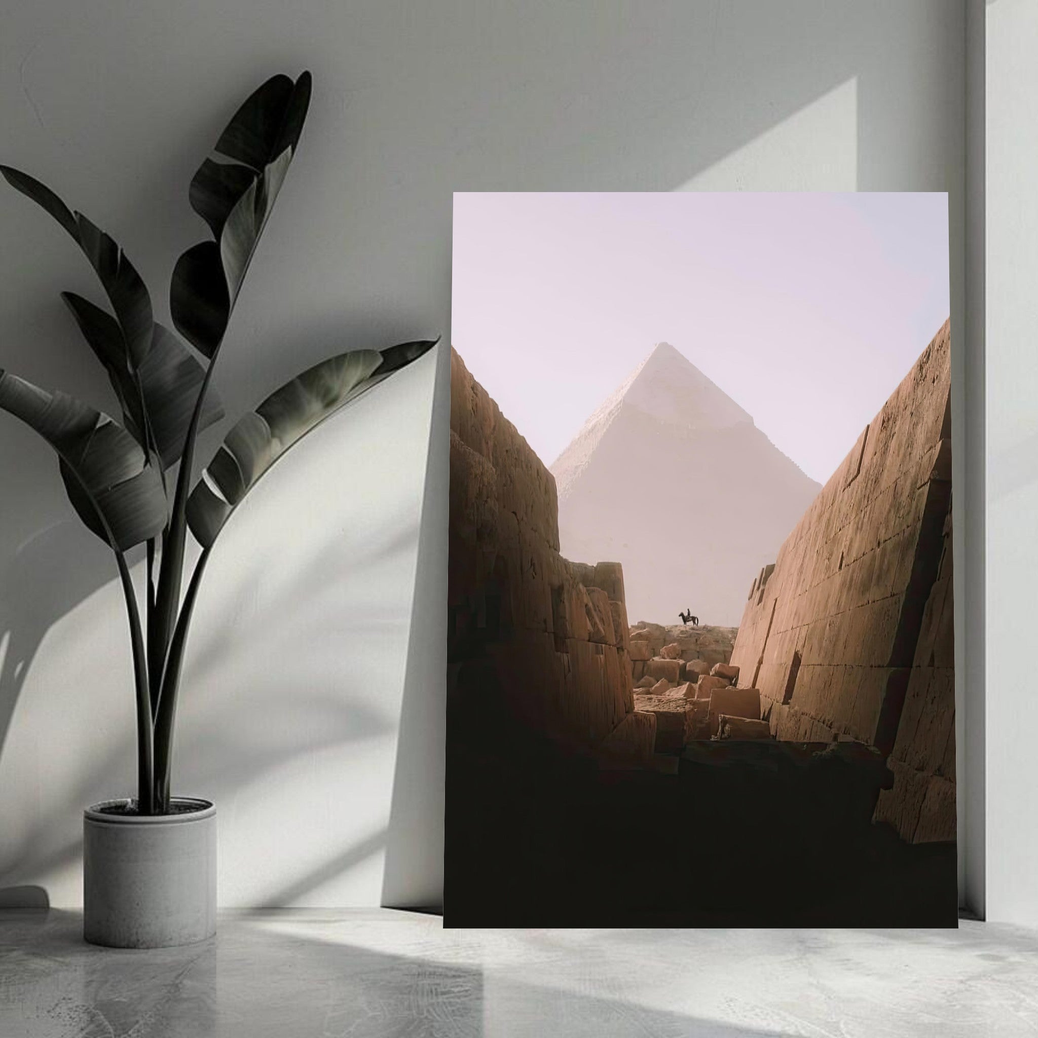 Silhouette of a horse rider against the Great Pyramid of Giza, framed by ancient stone walls.