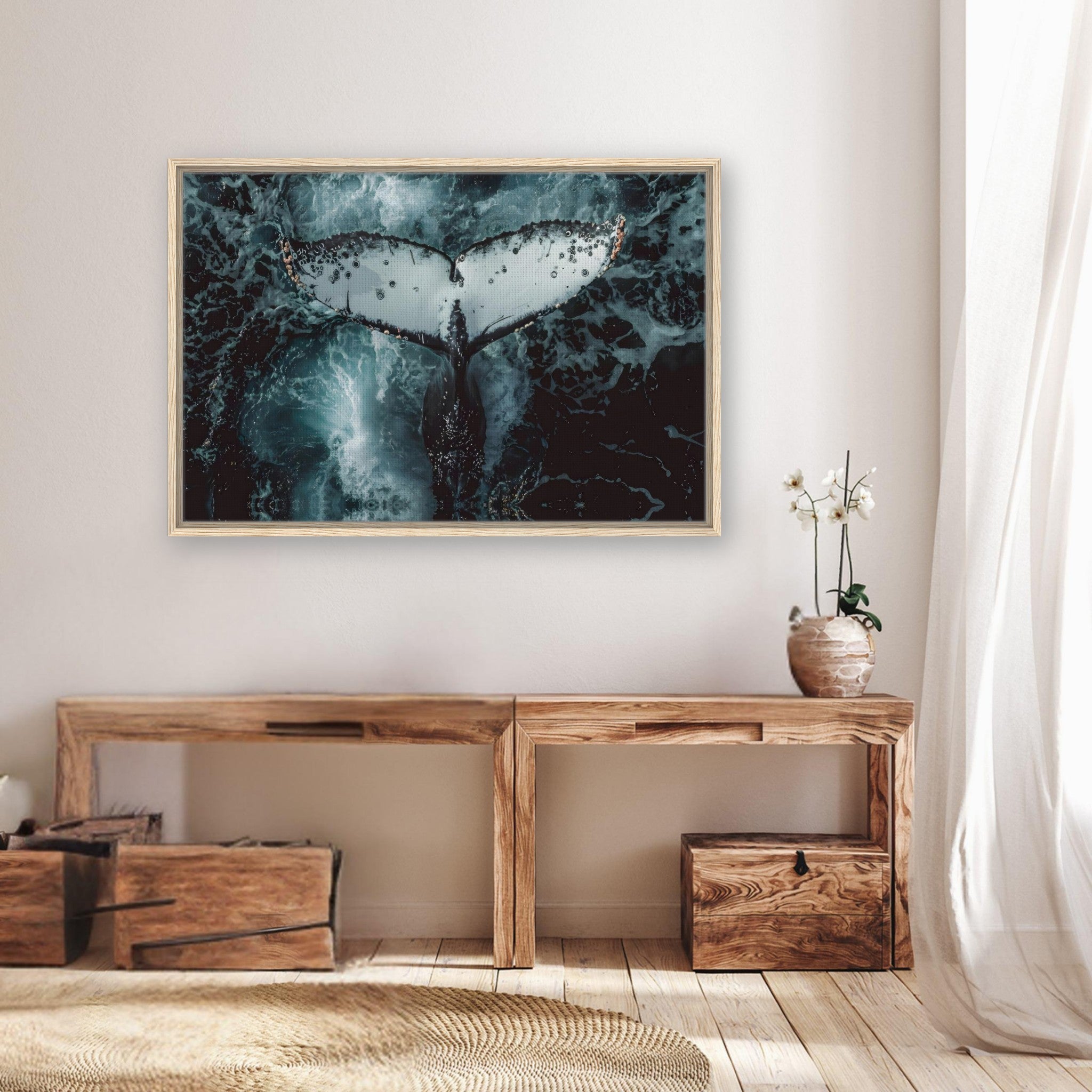 A stunning framed canvas print of a humpback whale's tail above swirling ocean waters, elegantly displayed in a home setting.