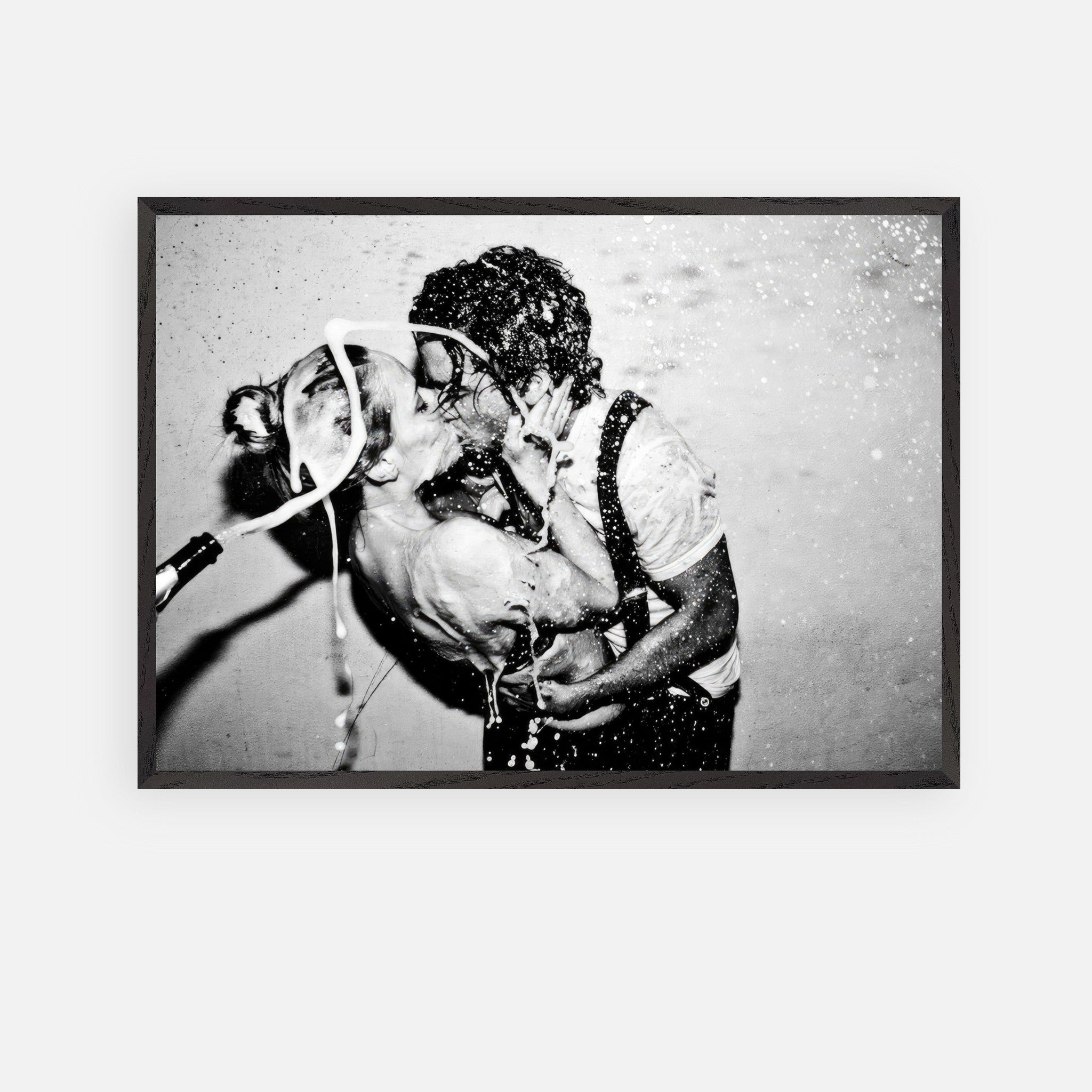 The Champagne Kiss fine art print of Johnny Depp and Kate Moss capturing raw passion and romance in black-and-white.