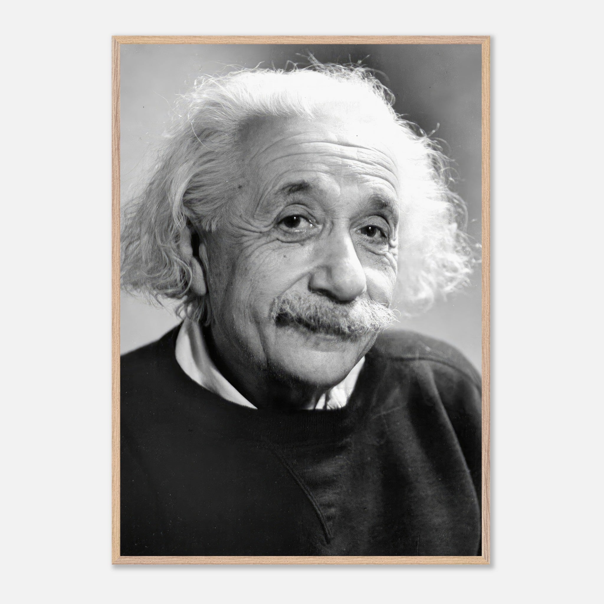 Black-and-white portrait of Albert Einstein, 1946, showcasing his wise expression and iconic hairstyle.