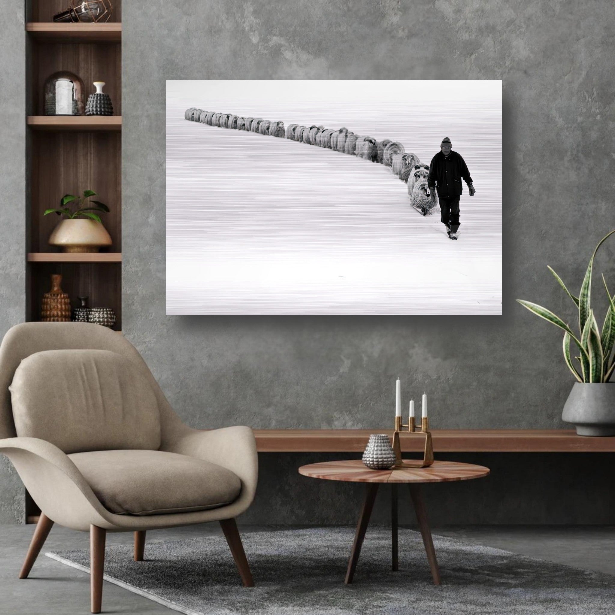 Brushed metal artwork of a shepherd leading sheep through a snow-covered landscape in black-and-white.