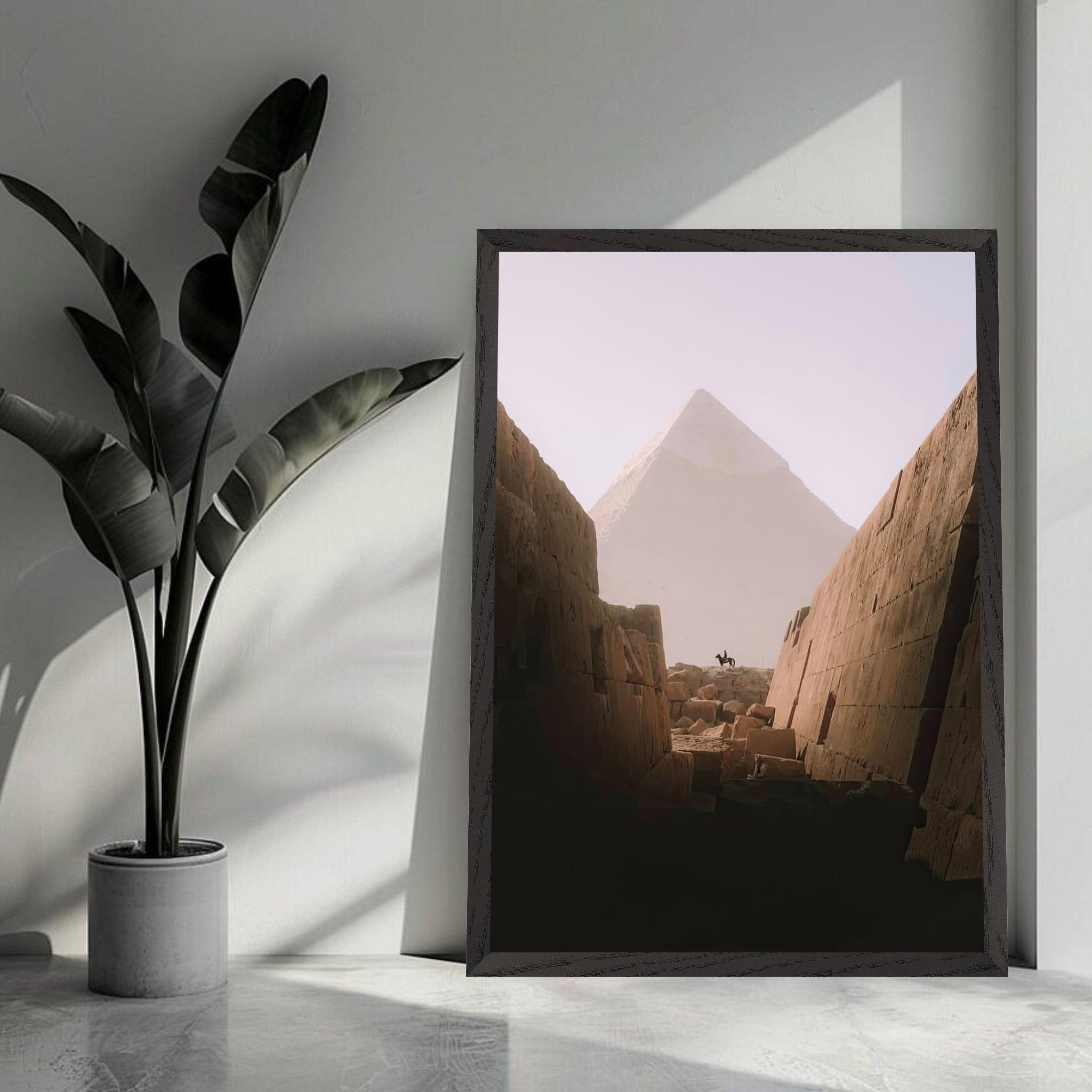 Fine art print of the Great Pyramid of Giza with a rider on horseback in a serene setting.