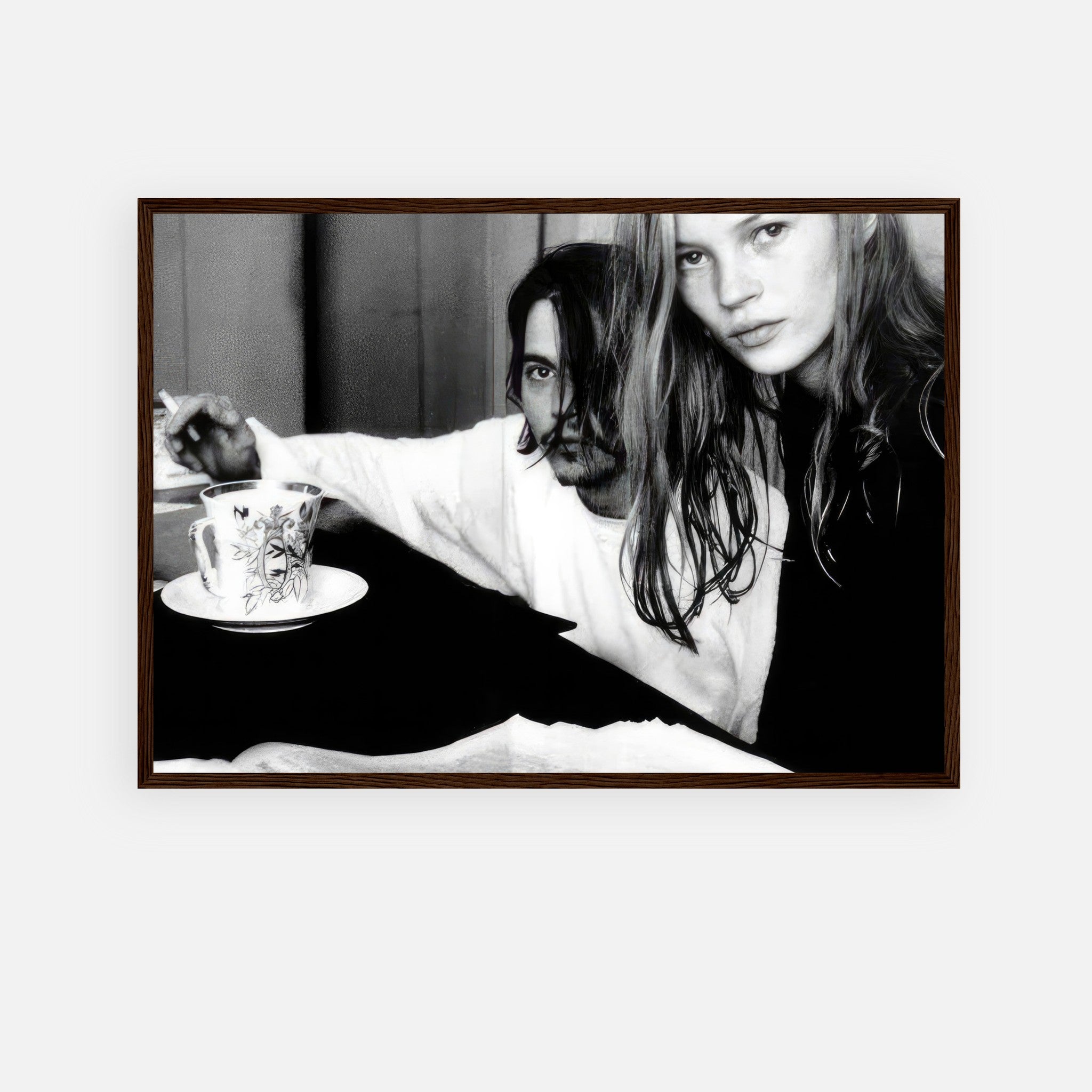 Framed print of Johnny Depp and Kate Moss, 1994 black-and-white photograph capturing the essence of 1990s romance.