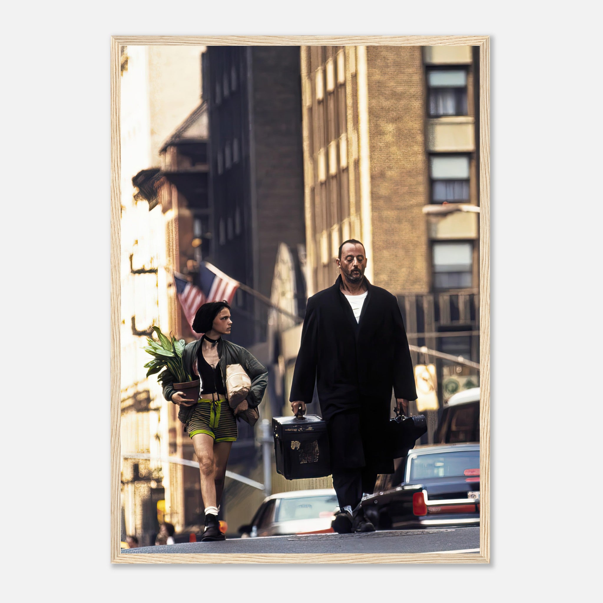 Jean Reno and Natalie Portman walking on city street in iconic scene from Leon framed print.