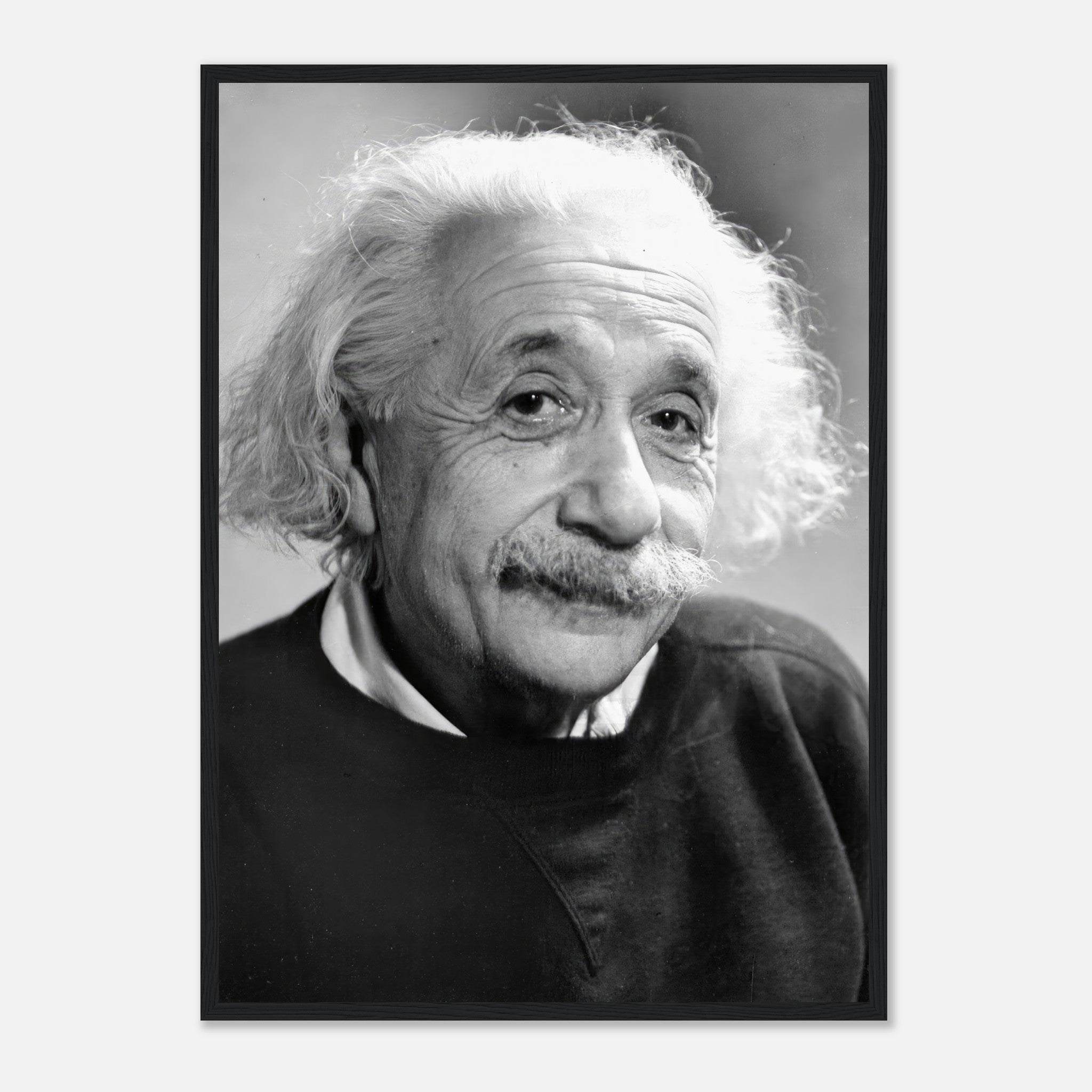 Black-and-white framed print of Albert Einstein, capturing his thoughtful expression and iconic appearance.
