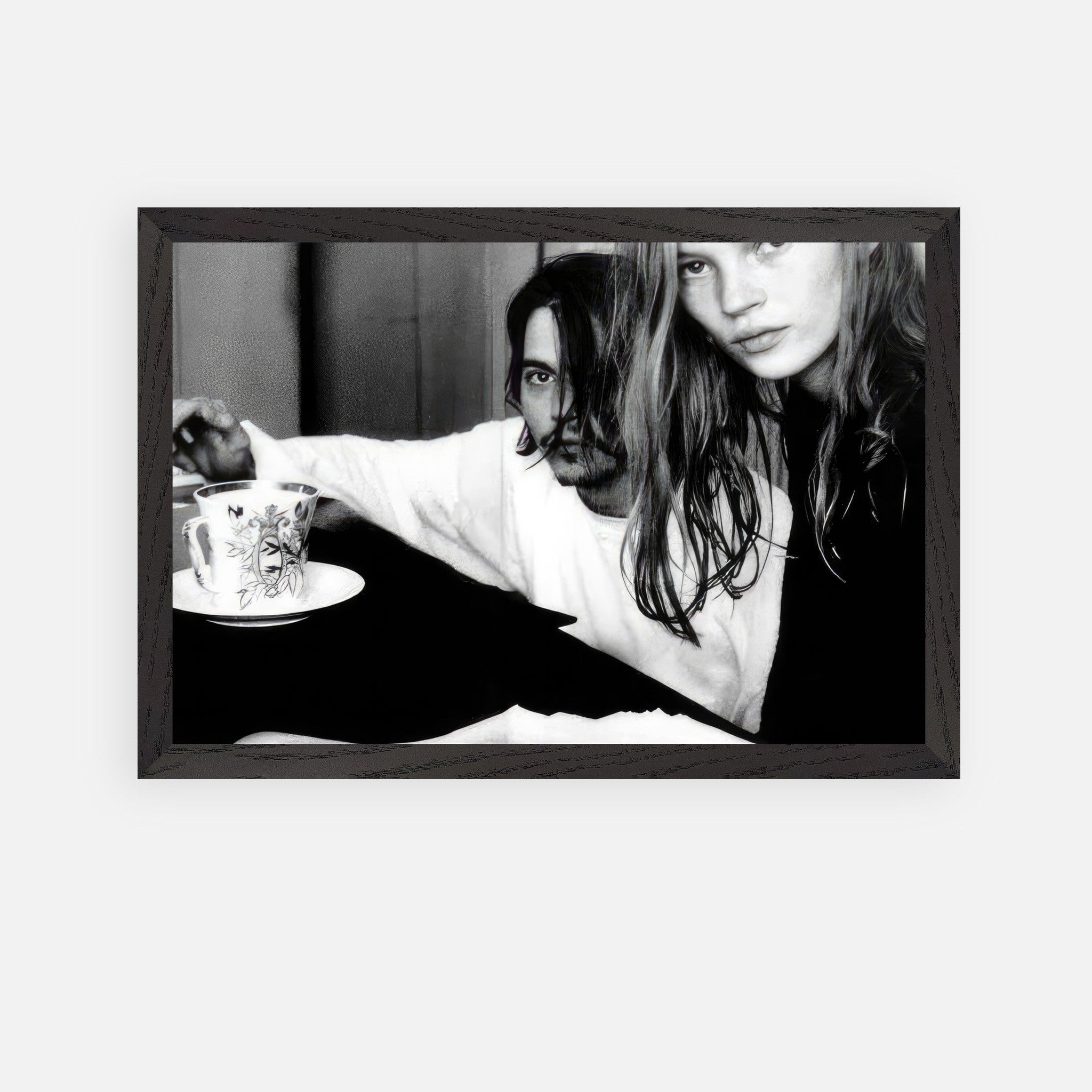 Black-and-white fine art print of Johnny Depp and Kate Moss, capturing 90s rebellion and romance.