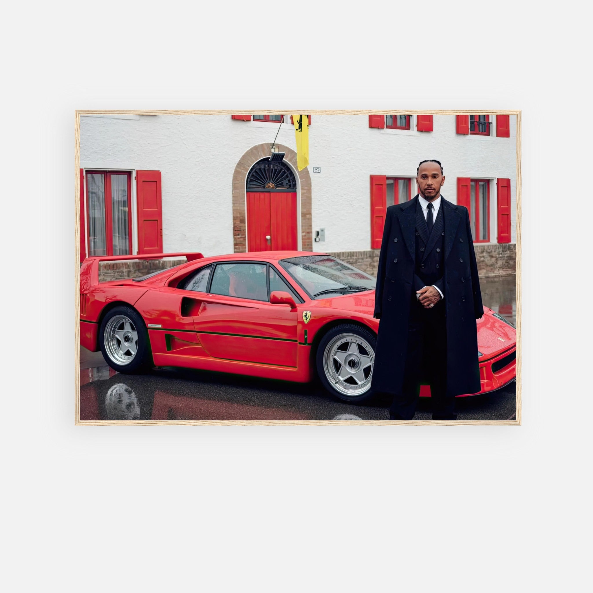 Lewis Hamilton posing with a Ferrari F40 in front of Enzo Ferrari's house, stunning framed print.