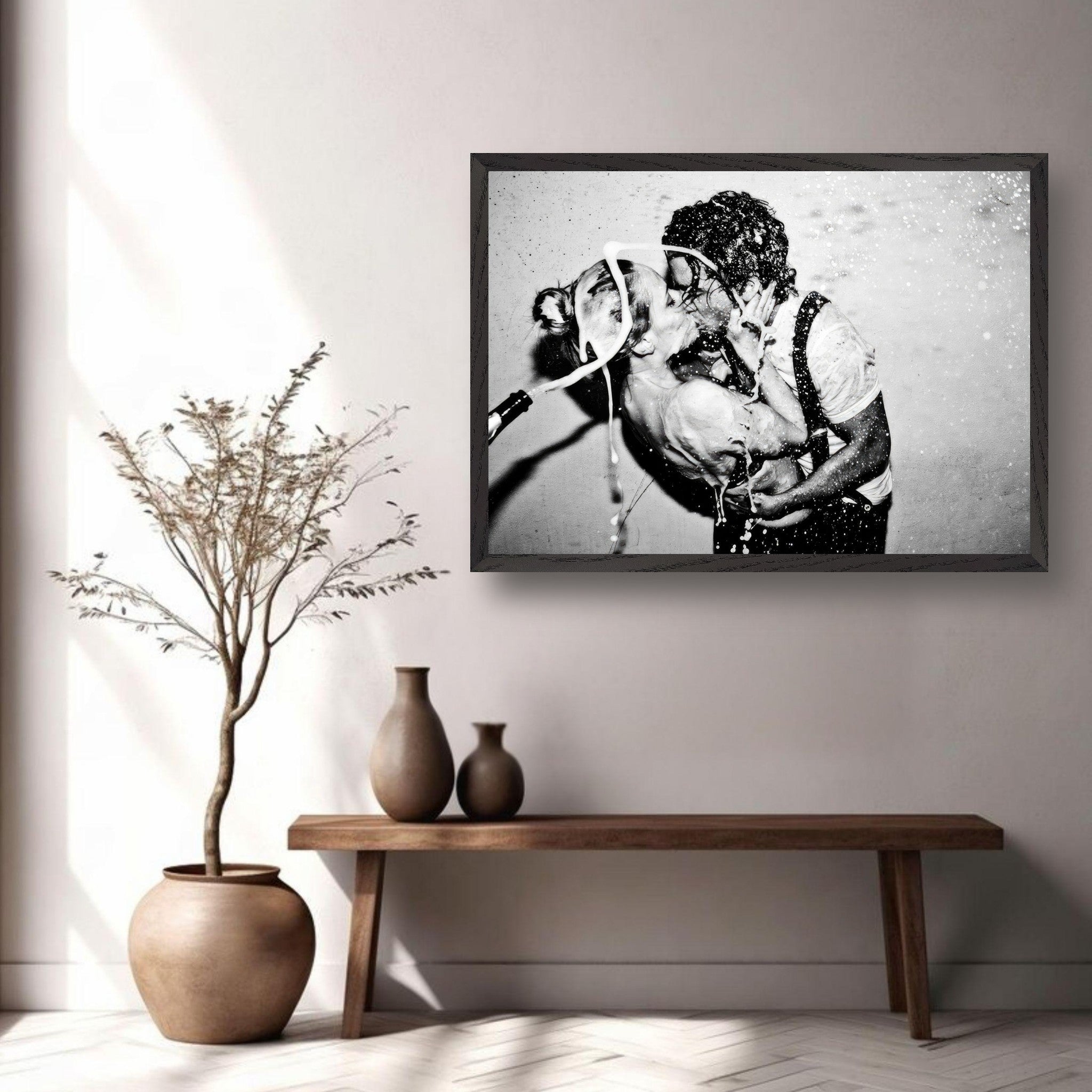 Black-and-white fine art print 'The Champagne Kiss' featuring Johnny Depp and Kate Moss in a passionate embrace.